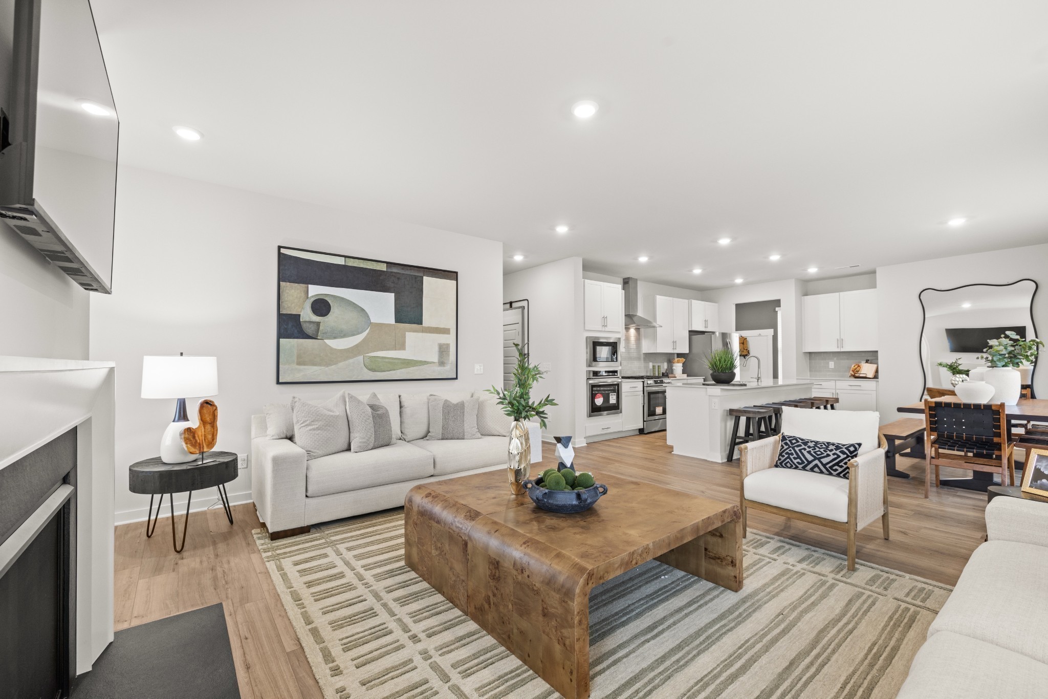 1516 Cherry Tree Lane Mount Juliet, TN 37122 - Photo 26 of 84 a living room with furniture kitchen view and a flat screen tv