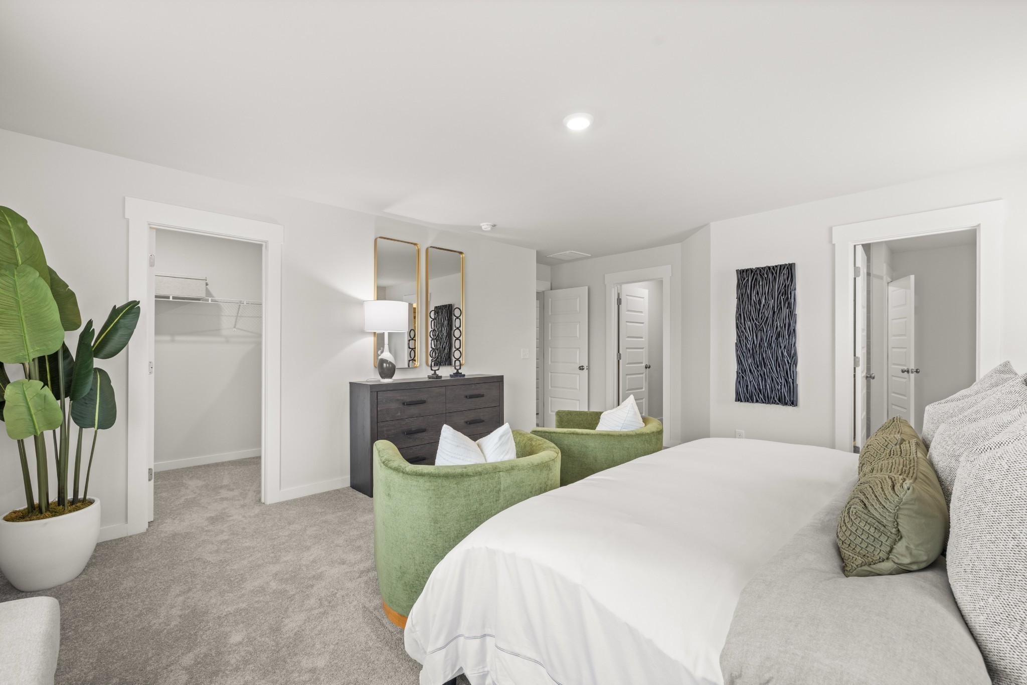 1516 Cherry Tree Lane Mount Juliet, TN 37122 - Photo 45 of 84 a bedroom with a bed and a potted plant