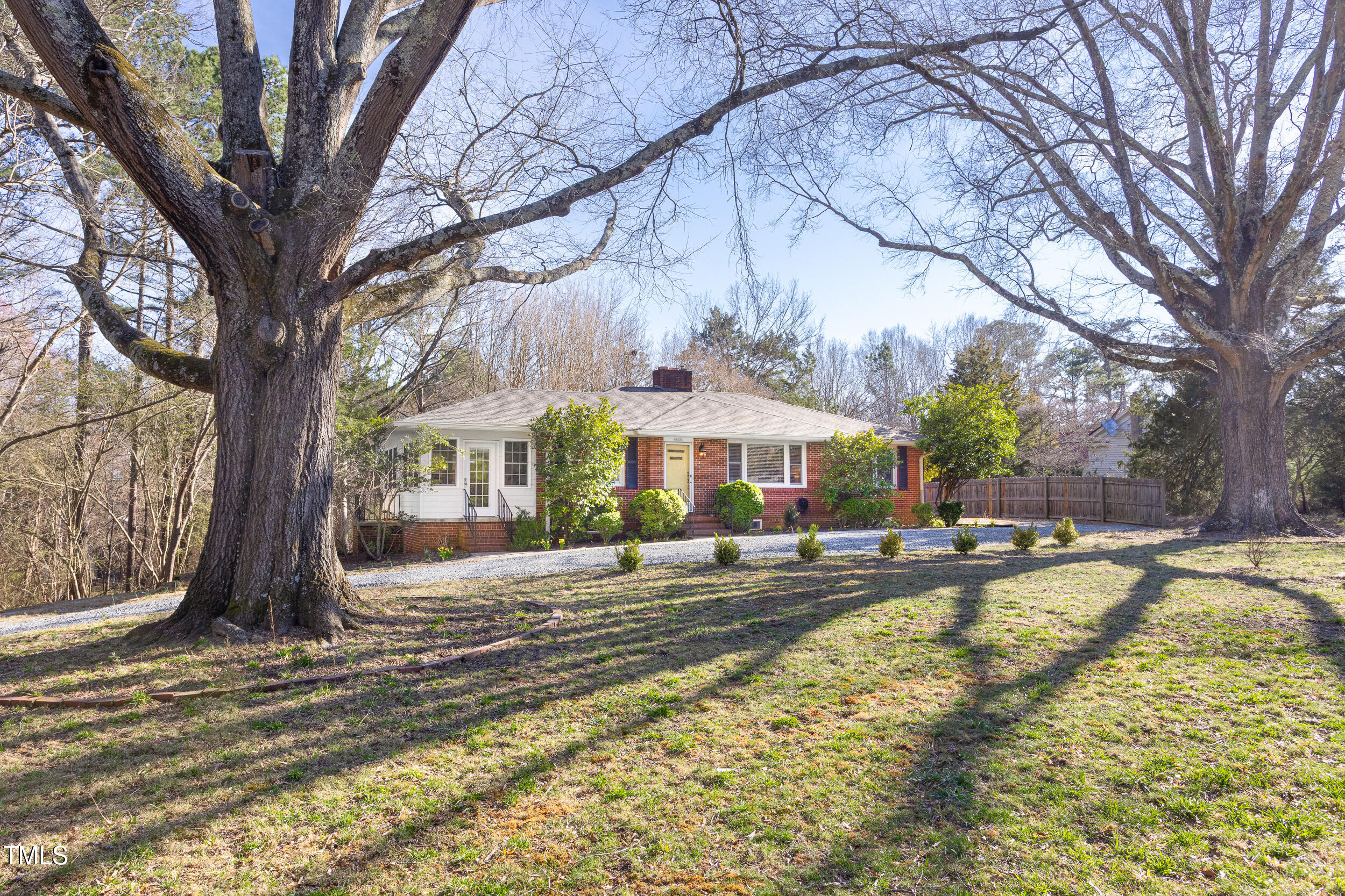4605 Erwin Road Durham, NC 27705 - Photo 1 of 54 a view of a house with snow on the tree