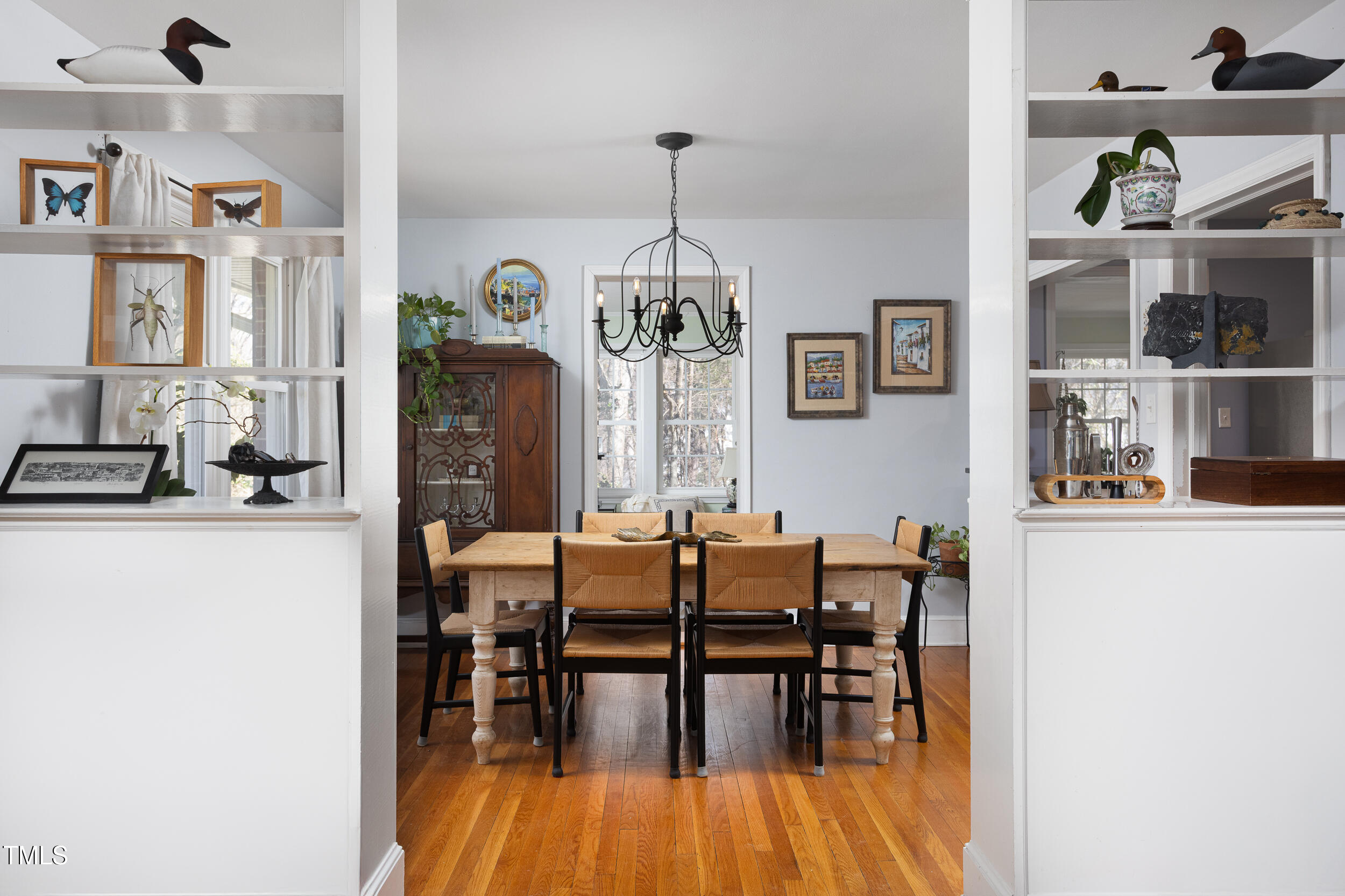 4605 Erwin Road Durham, NC 27705 - Photo 10 of 54 a dining room with furniture window and wooden floor