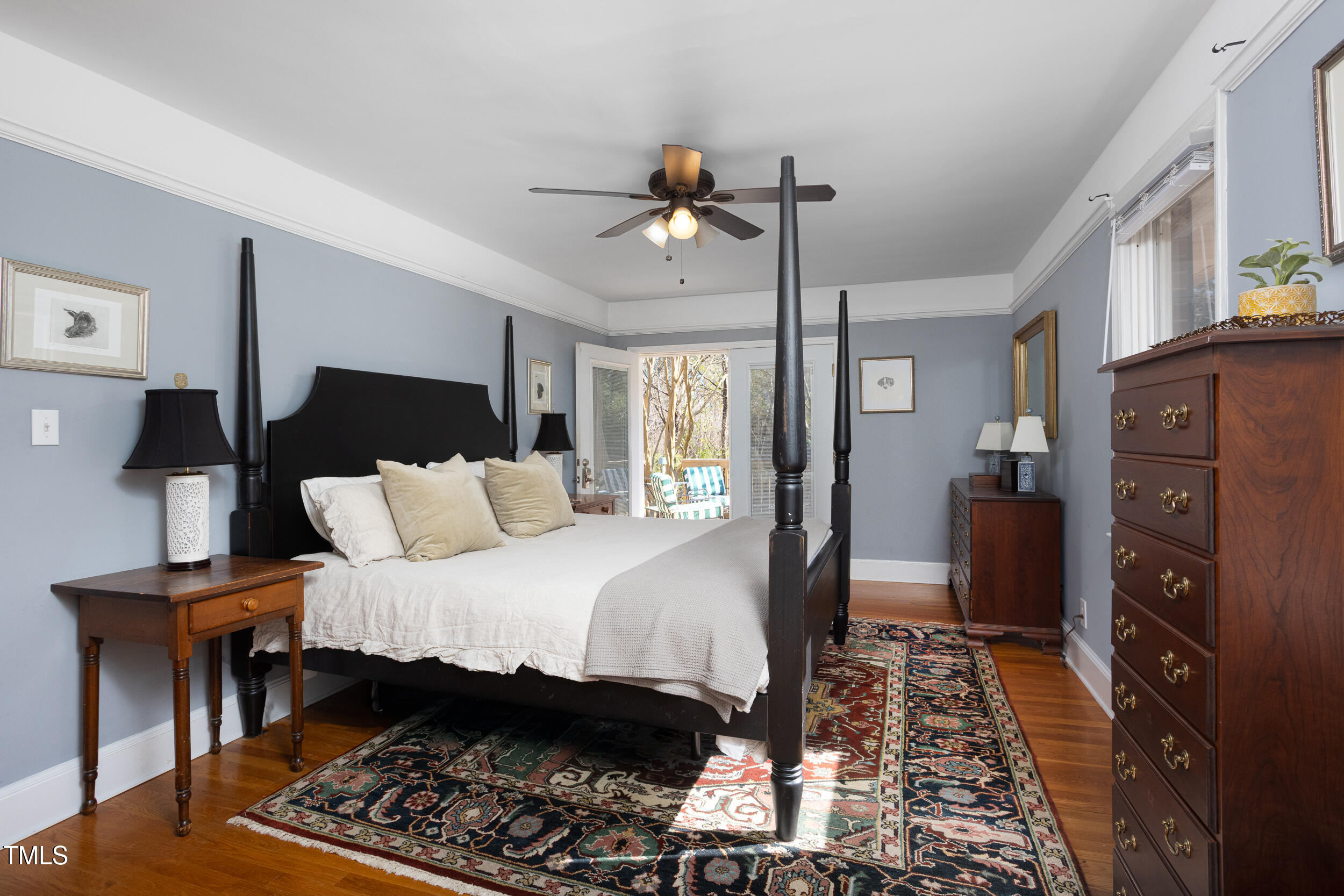 4605 Erwin Road Durham, NC 27705 - Photo 23 of 54 a bedroom with bed and wooden floor