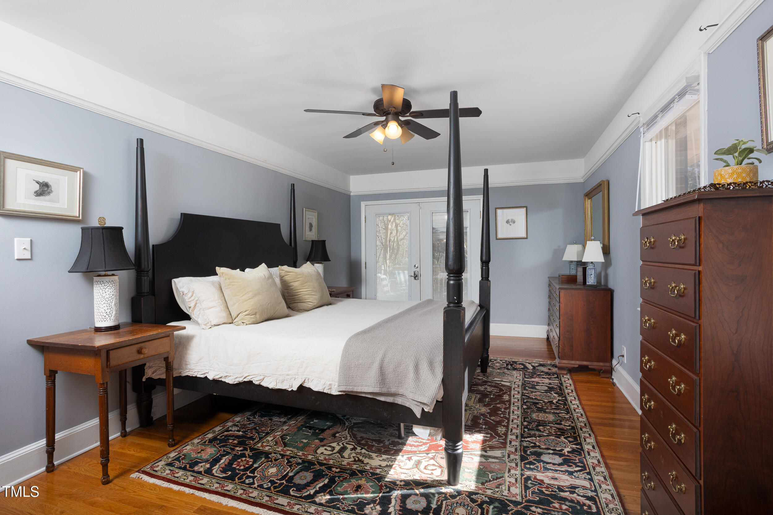 4605 Erwin Road Durham, NC 27705 - Photo 24 of 54 a bedroom with a bed and a refrigerator