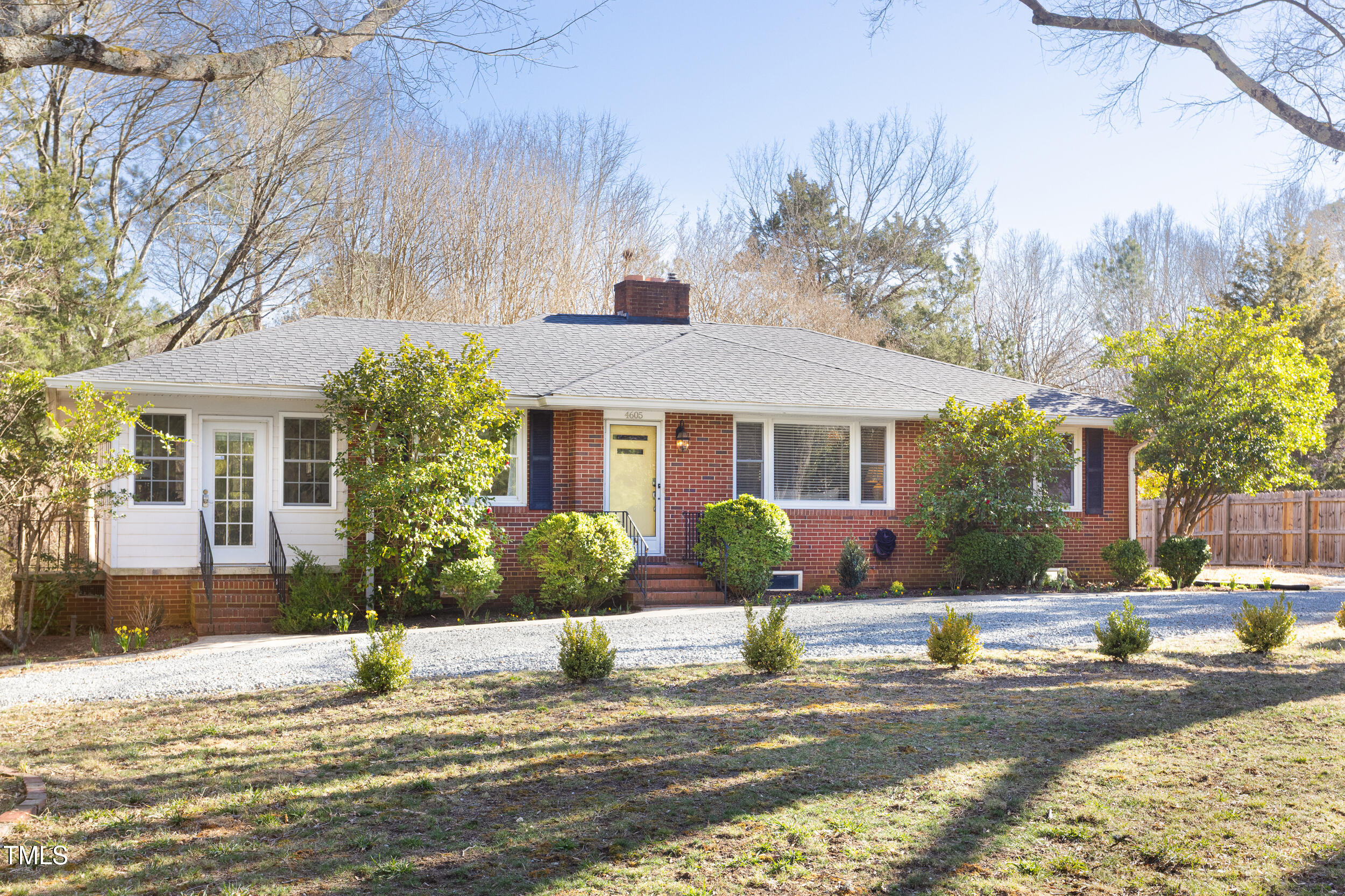 4605 Erwin Road Durham, NC 27705 - Photo 2 of 54 a front view of a house with garden