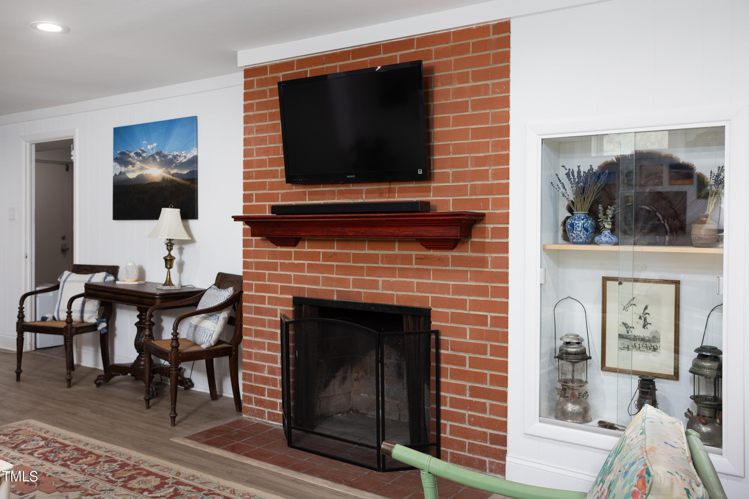 4605 Erwin Road Durham, NC 27705 - Photo 35 of 54 a living room with furniture and a flat screen tv