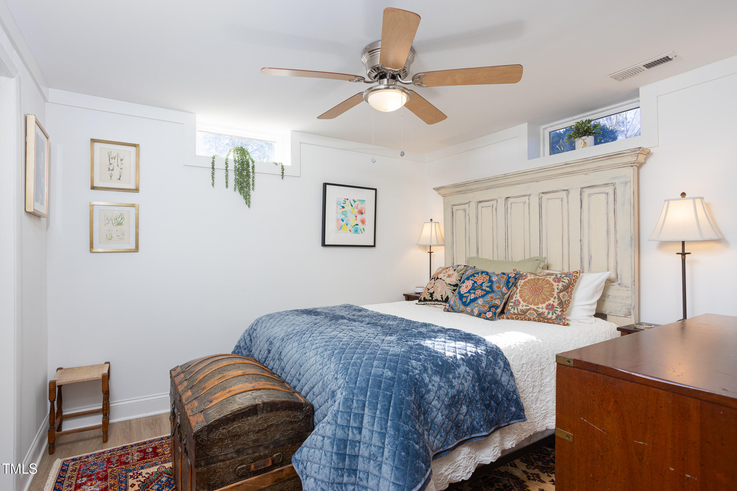 4605 Erwin Road Durham, NC 27705 - Photo 38 of 54 a bedroom with a bed and window