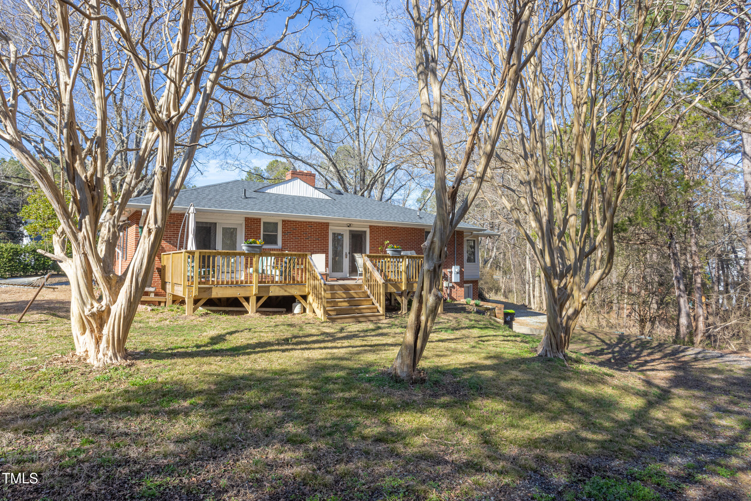 4605 Erwin Road Durham, NC 27705 - Photo 47 of 54 a view of a house with a yard and a large tree