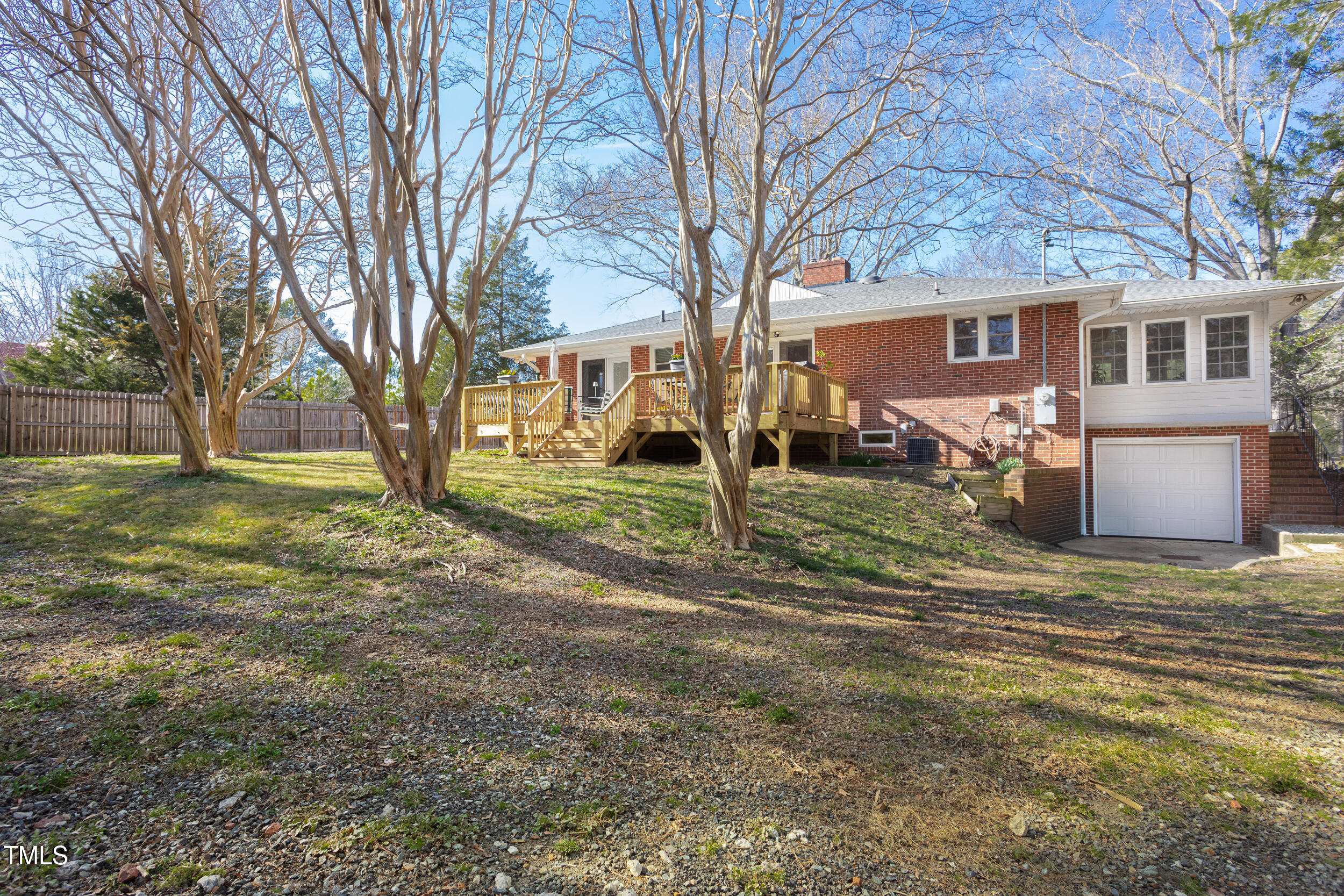 4605 Erwin Road Durham, NC 27705 - Photo 49 of 54 a view of a yard with a house and a tree