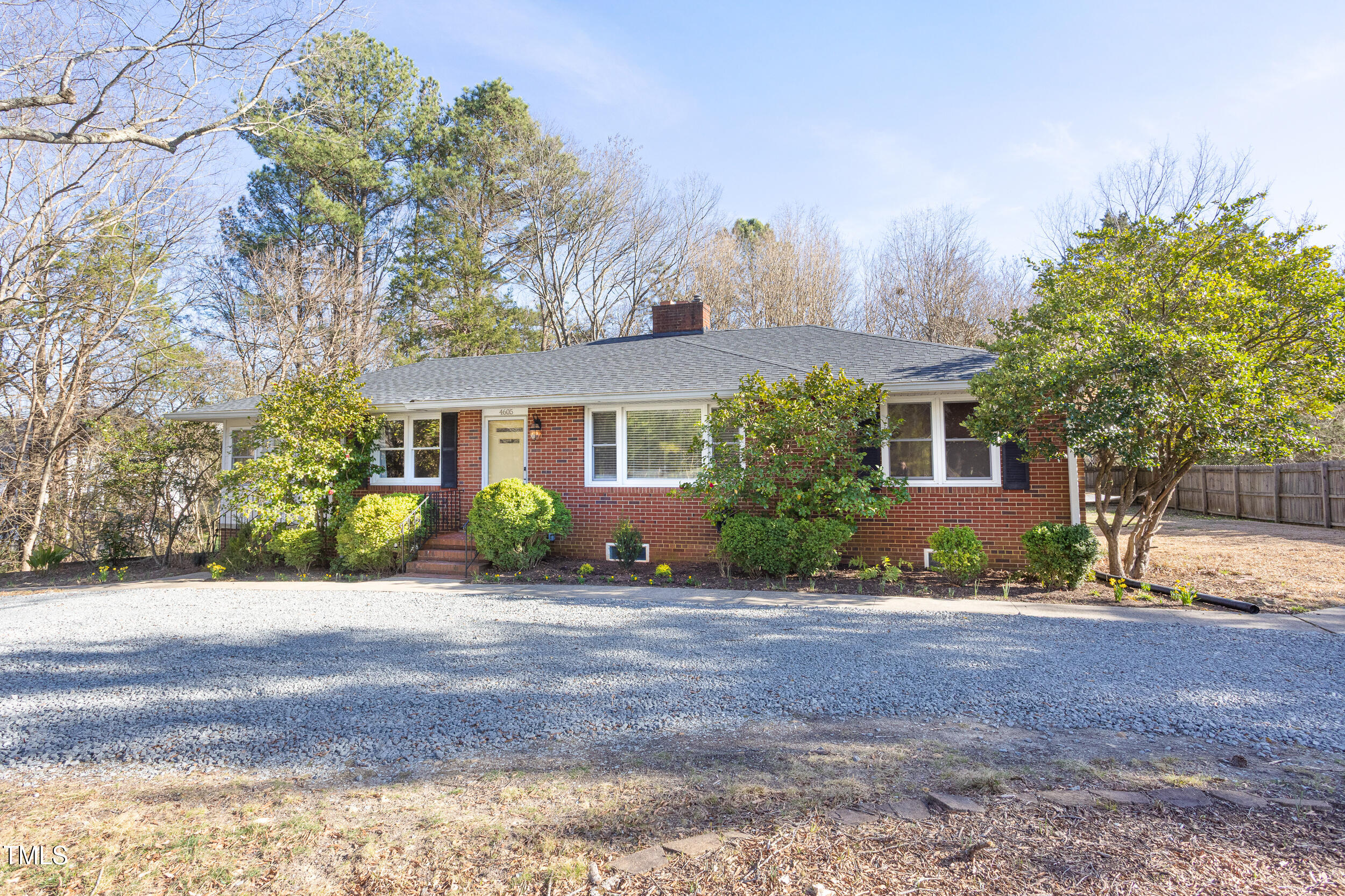 4605 Erwin Road Durham, NC 27705 - Photo 51 of 54 a front view of a house with a yard and a garage