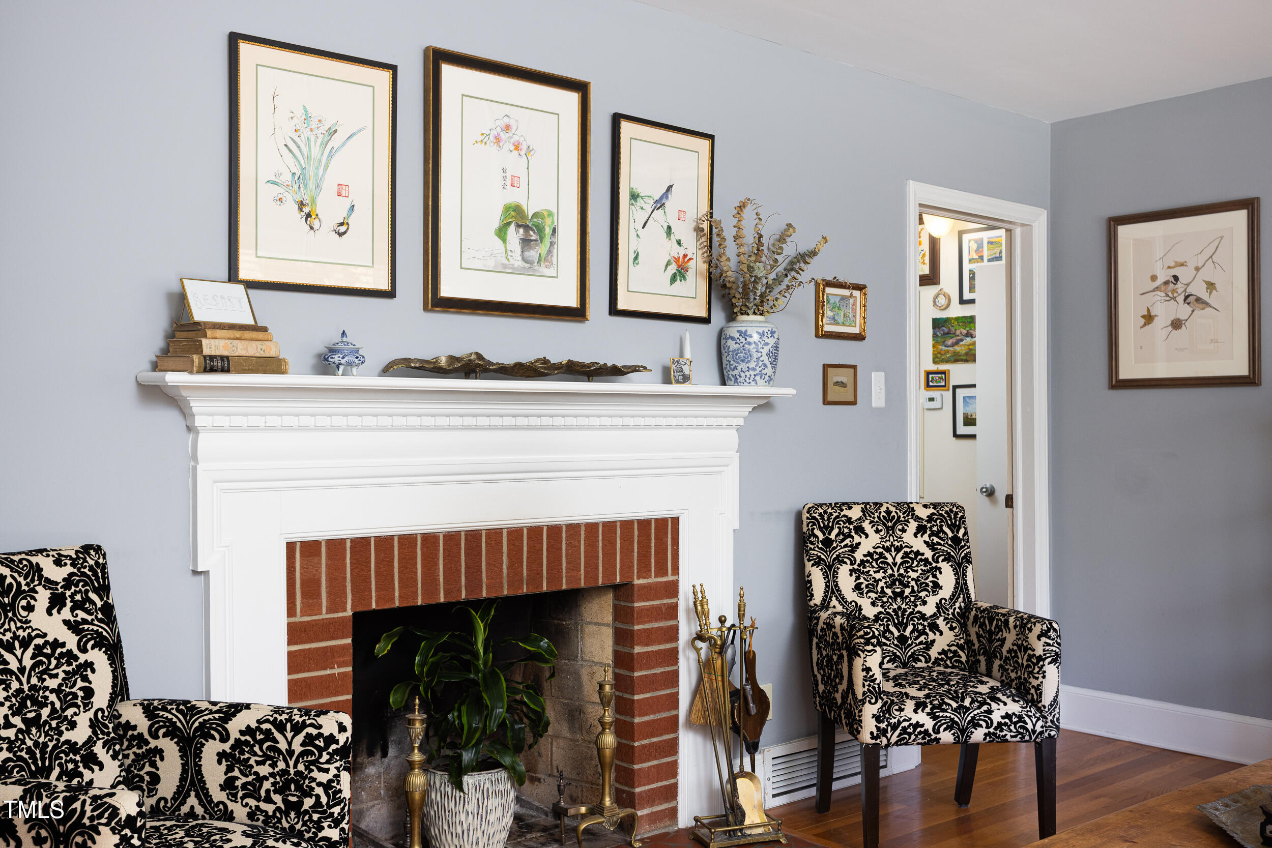 4605 Erwin Road Durham, NC 27705 - Photo 7 of 54 a living room with furniture and a fireplace