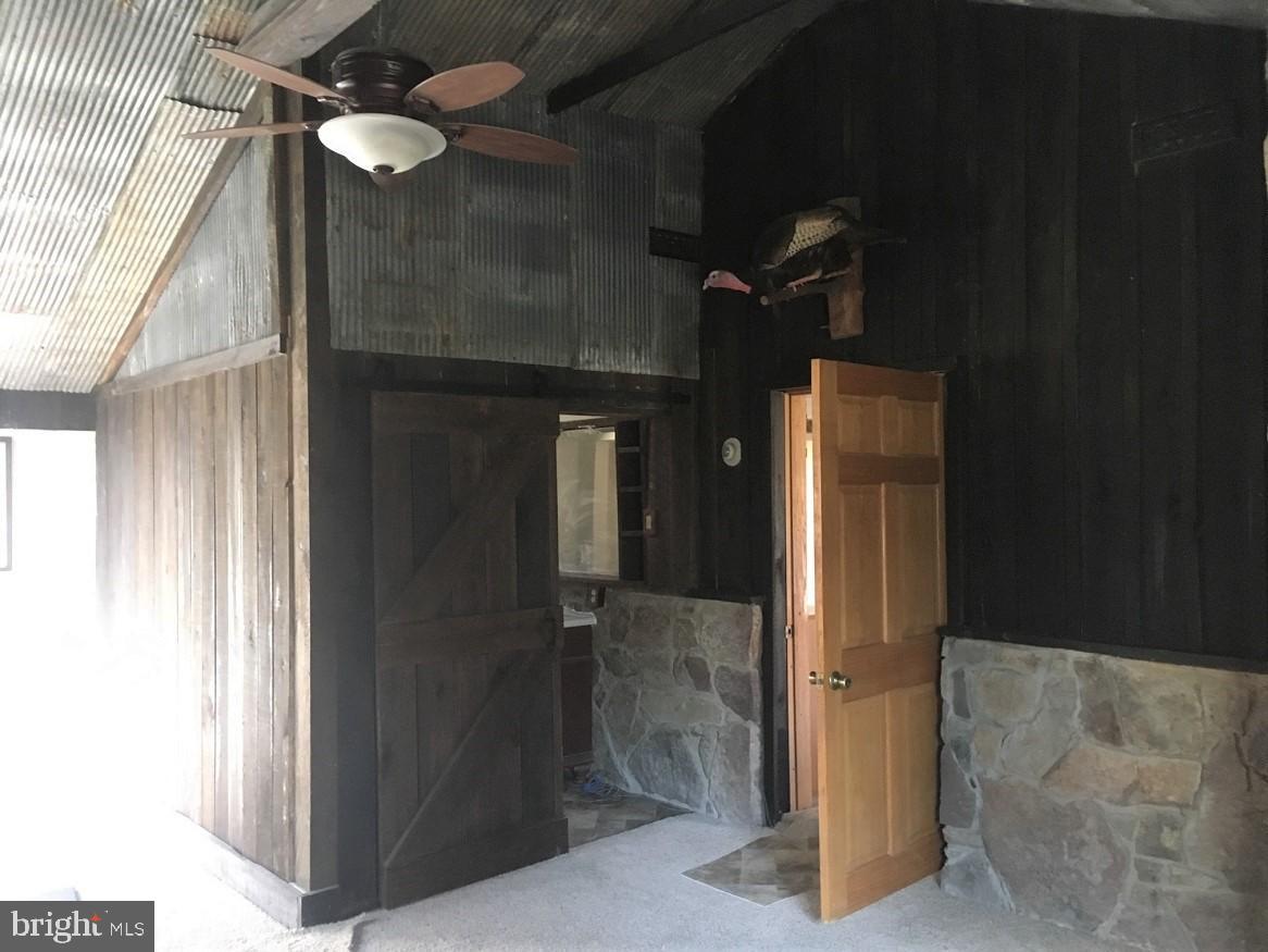 4144 Cold Run Valley Road Berkeley Springs, WV 25411 - Photo 11 of 34 GREAT ROOM OR MASTER BR