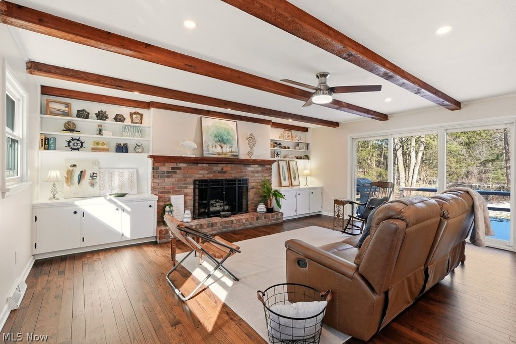 4699 West Bath Road Akron, OH 44333 - Photo 19 of 50 Living room with a ceiling fan, plenty of natural light, hard wood floors, and beamed ceiling