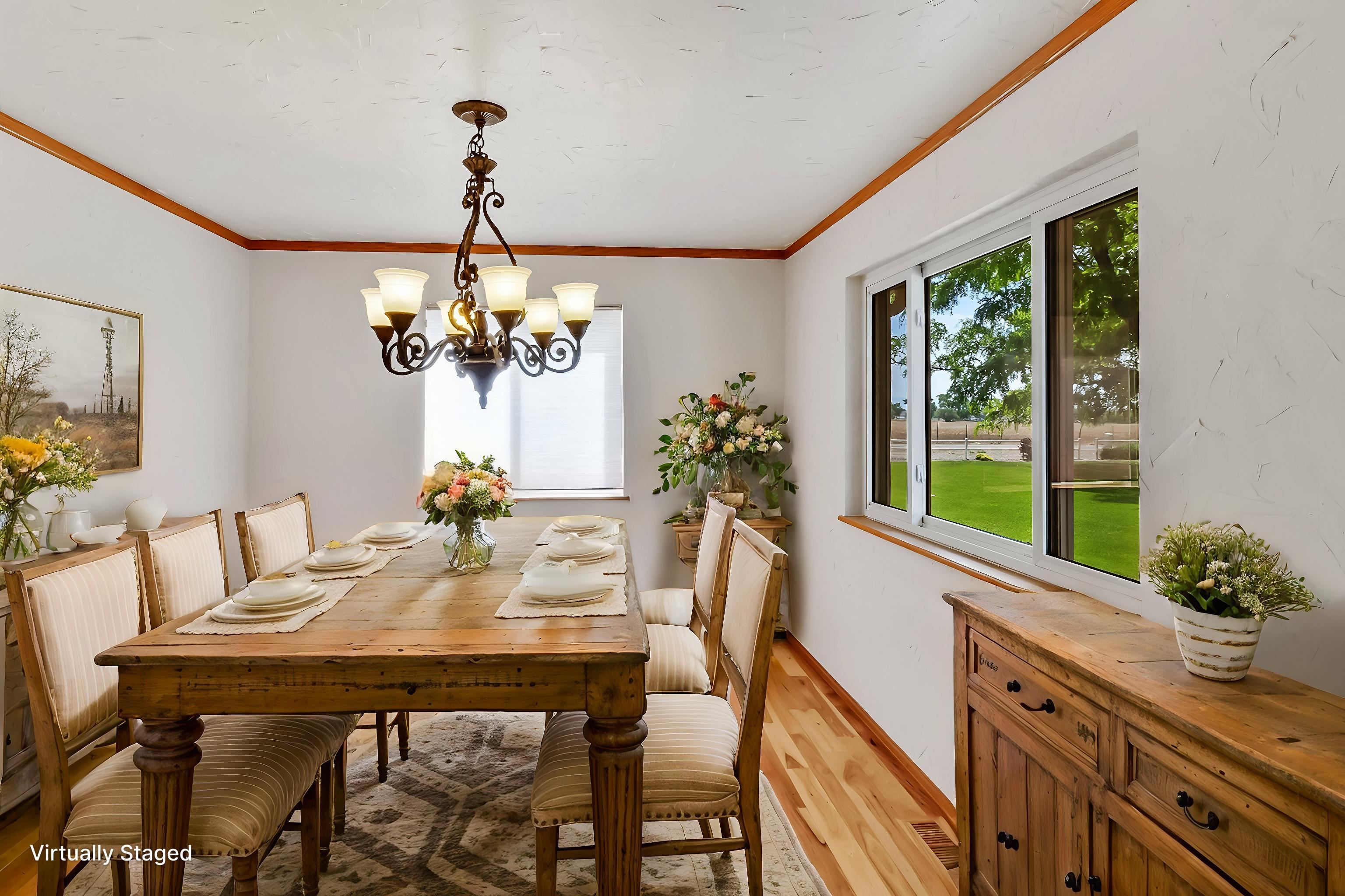 1847 7 Road Mack, CO 81525 - Photo 12 of 42 a view of a dining room with furniture a chandelier and large windows