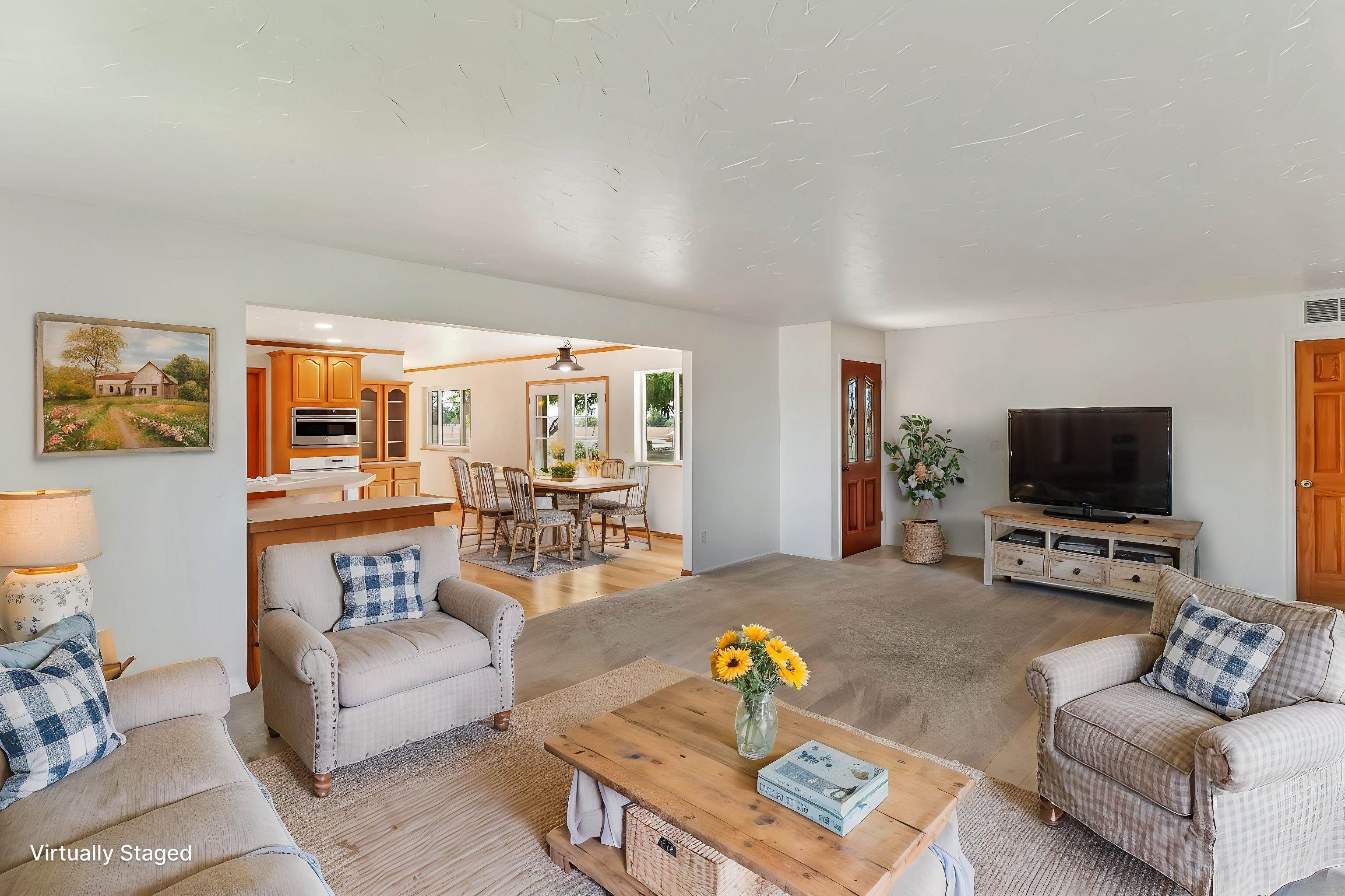 1847 7 Road Mack, CO 81525 - Photo 13 of 42 a living room with furniture and a flat screen tv