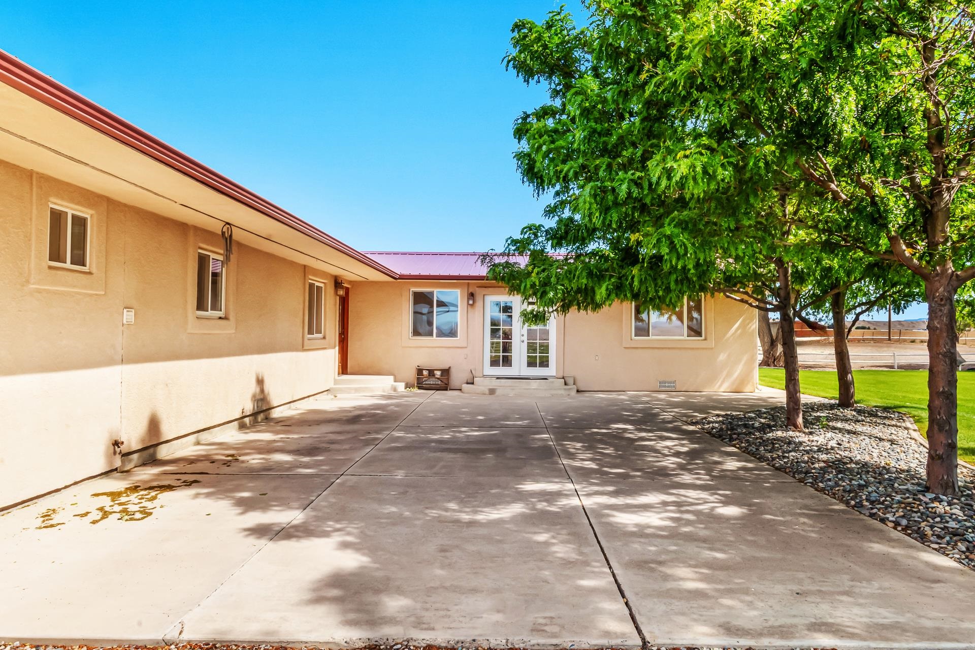 1847 7 Road Mack, CO 81525 - Photo 2 of 42 a front view of a house with a yard and garage