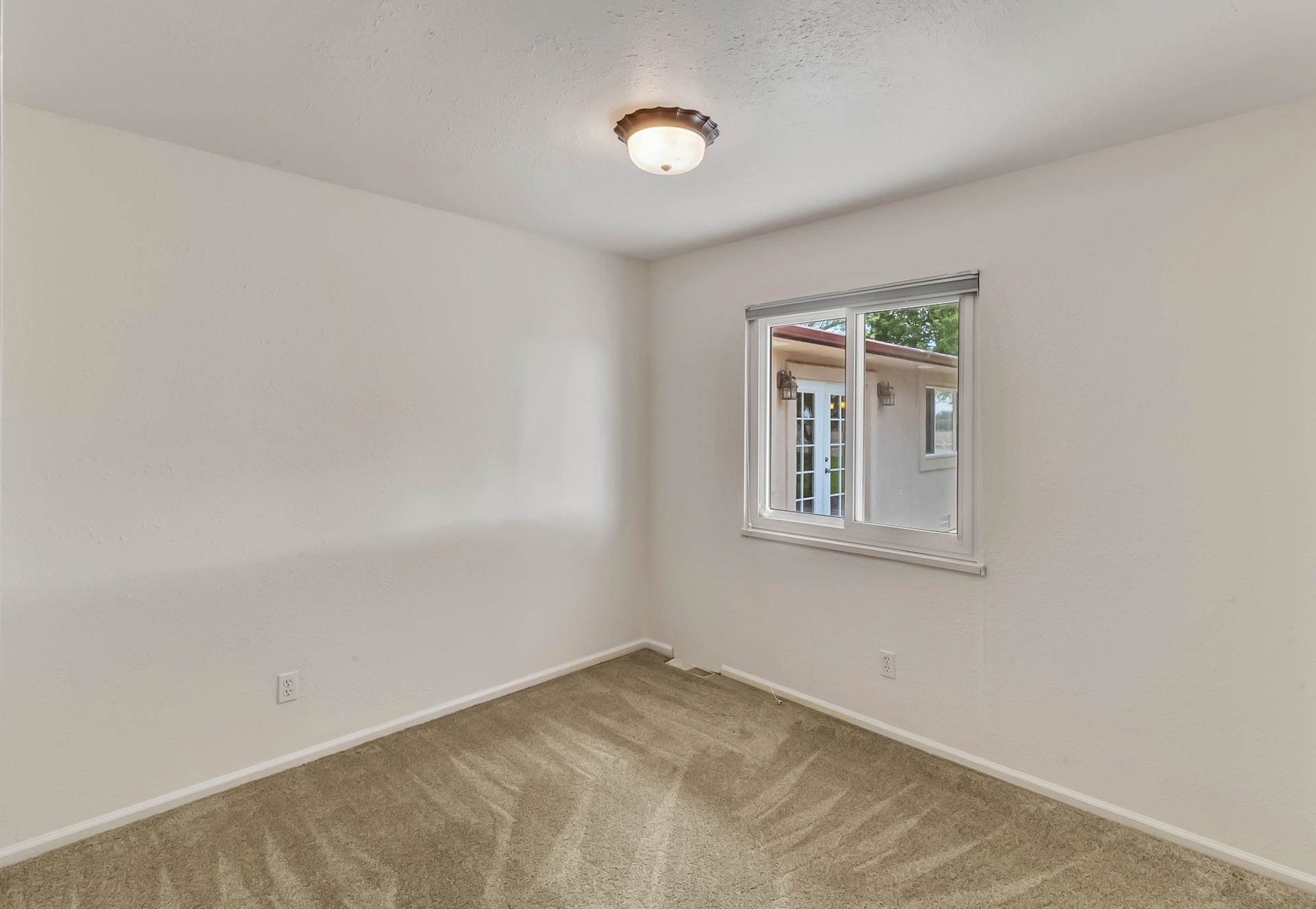 1847 7 Road Mack, CO 81525 - Photo 23 of 42 a view of an empty room with a window