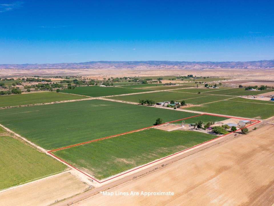 1847 7 Road Mack, CO 81525 - Photo 3 of 42 a view of a green field with clear sky