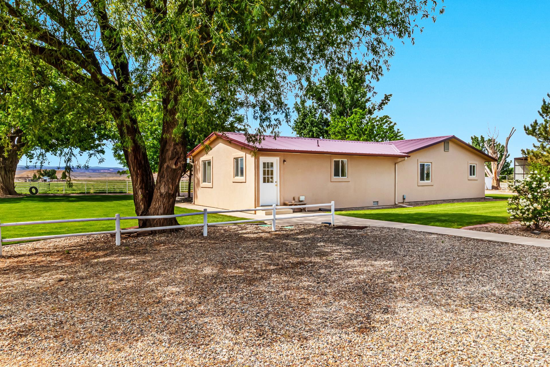 1847 7 Road Mack, CO 81525 - Photo 6 of 42 a view of a house with backyard and tree
