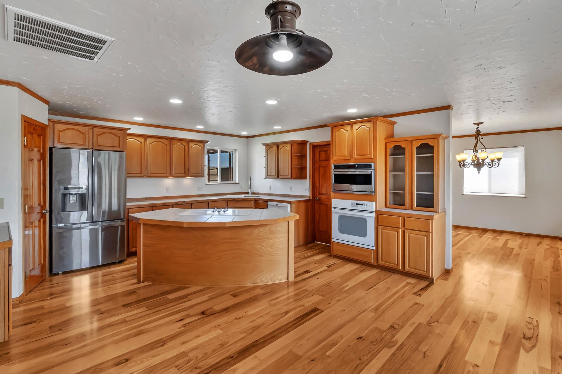 1847 7 Road Mack, CO 81525 - Photo 7 of 42 a kitchen with stainless steel appliances granite countertop a stove and a refrigerator