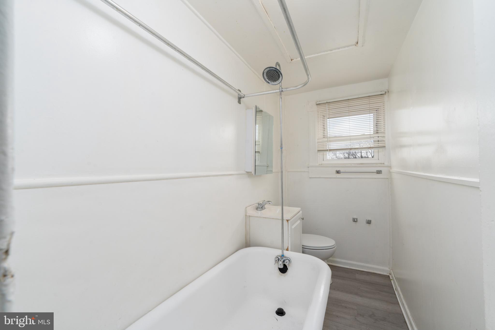 514 Brunswick Street Baltimore, MD 21223 - Photo 12 of 26 a bathroom with a bathtub