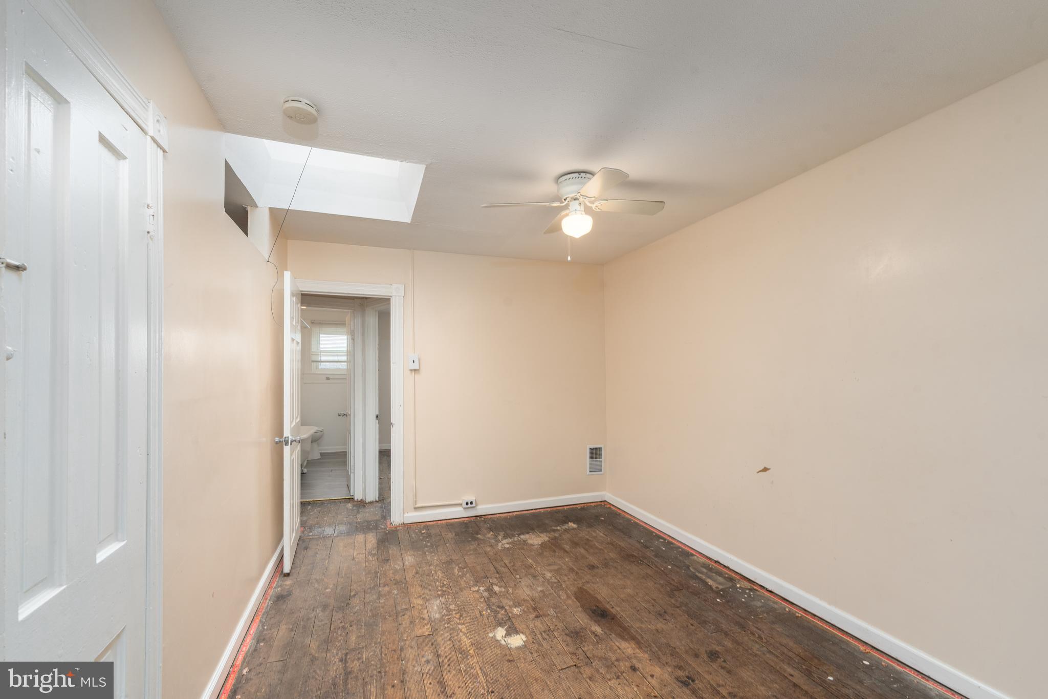 514 Brunswick Street Baltimore, MD 21223 - Photo 16 of 26 a view of a livingroom with wooden floor