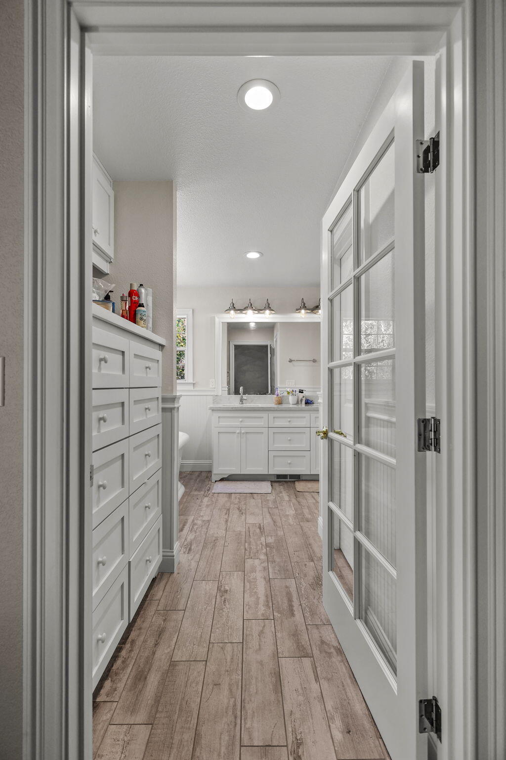 2366 Templeton Drive Redding, CA 96002 - Photo 22 of 54 a view of a hallway with wooden floor