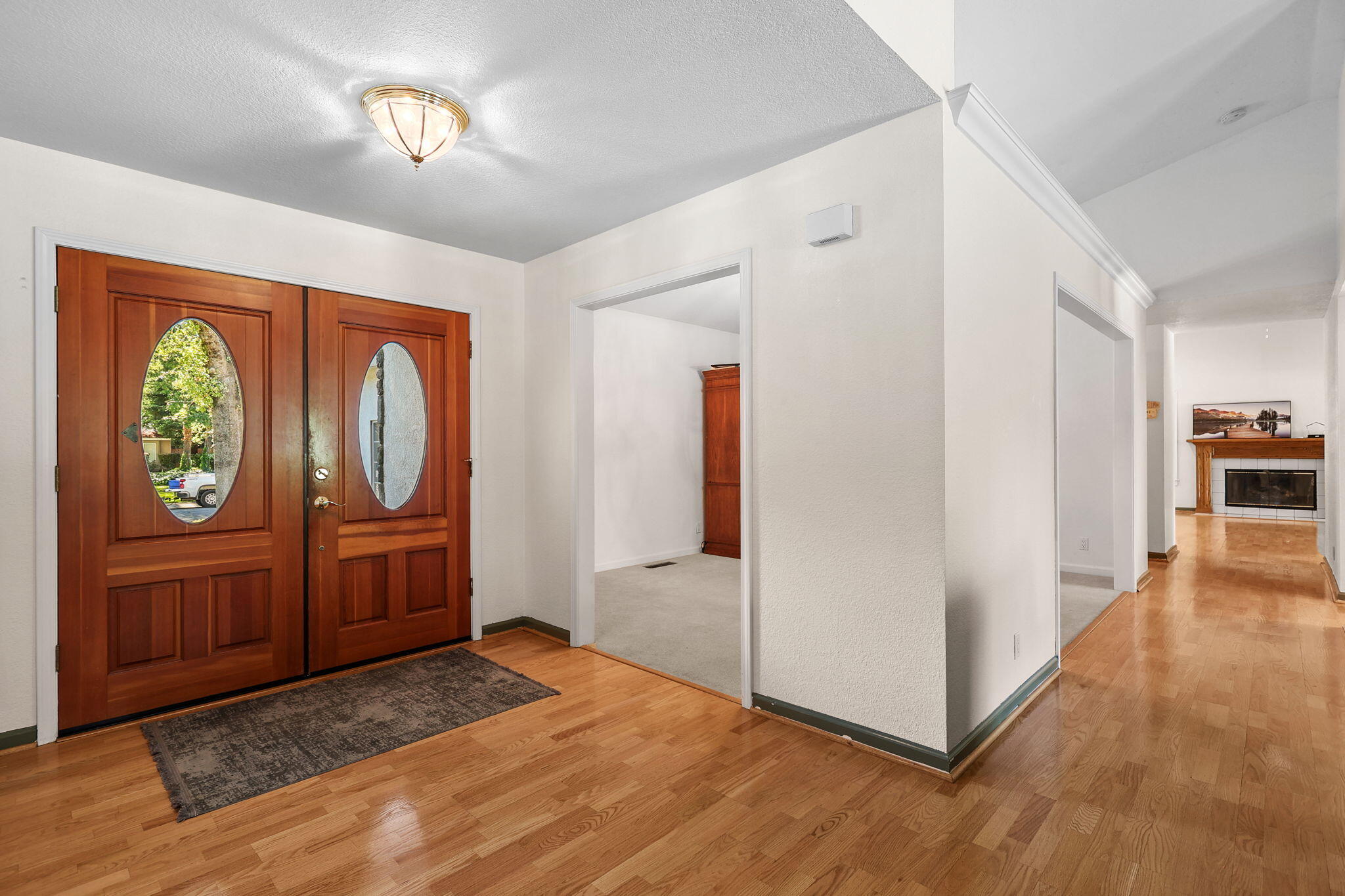 2366 Templeton Drive Redding, CA 96002 - Photo 3 of 54 a view of an entryway with wooden floor