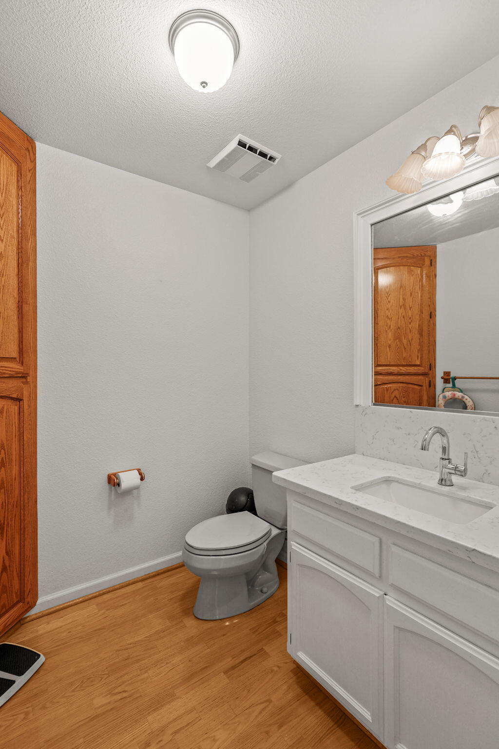 2366 Templeton Drive Redding, CA 96002 - Photo 36 of 54 a bathroom with a sink a toilet a mirror and shower