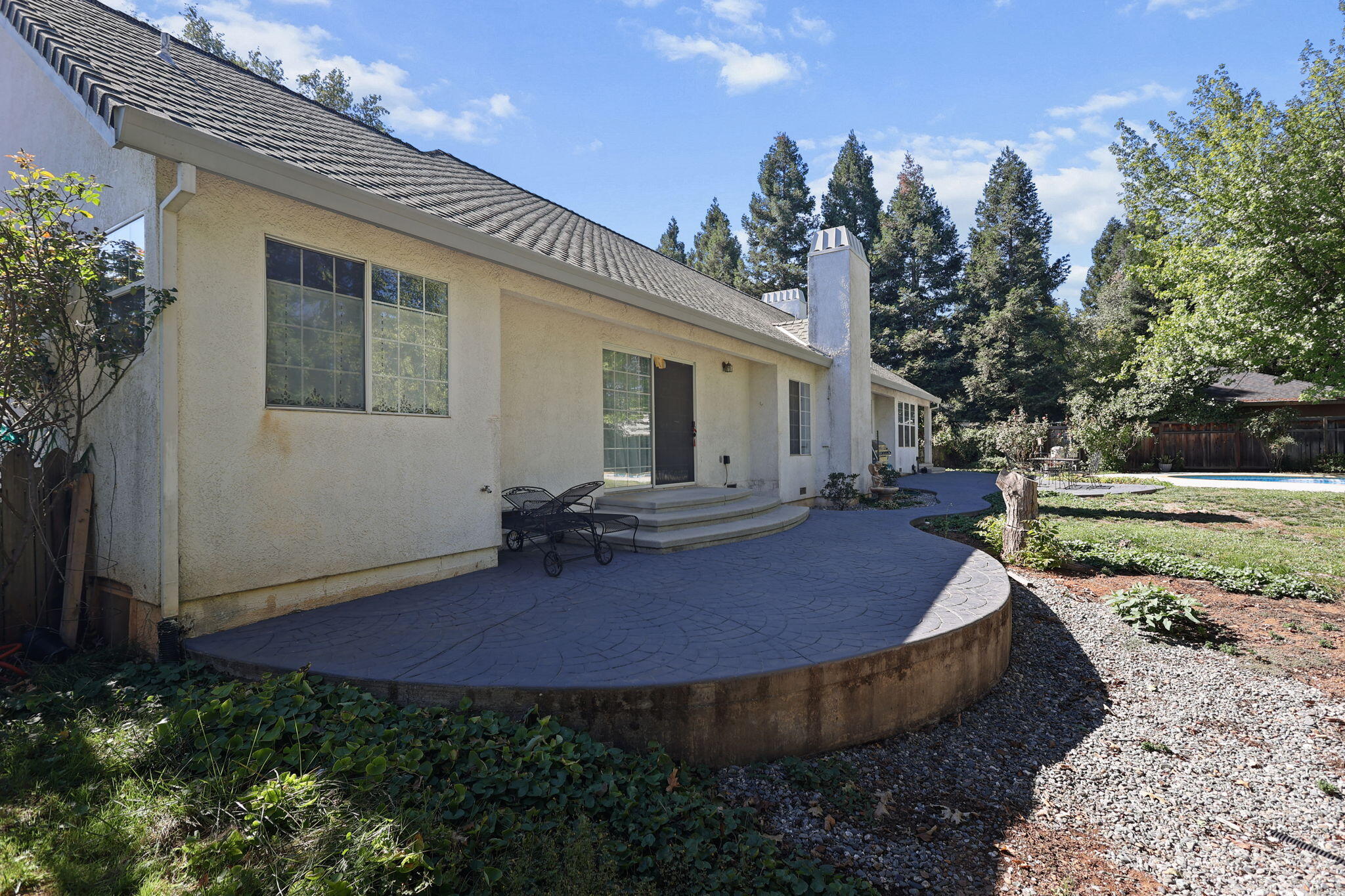 2366 Templeton Drive Redding, CA 96002 - Photo 47 of 54 a view of a house with backyard and sitting area