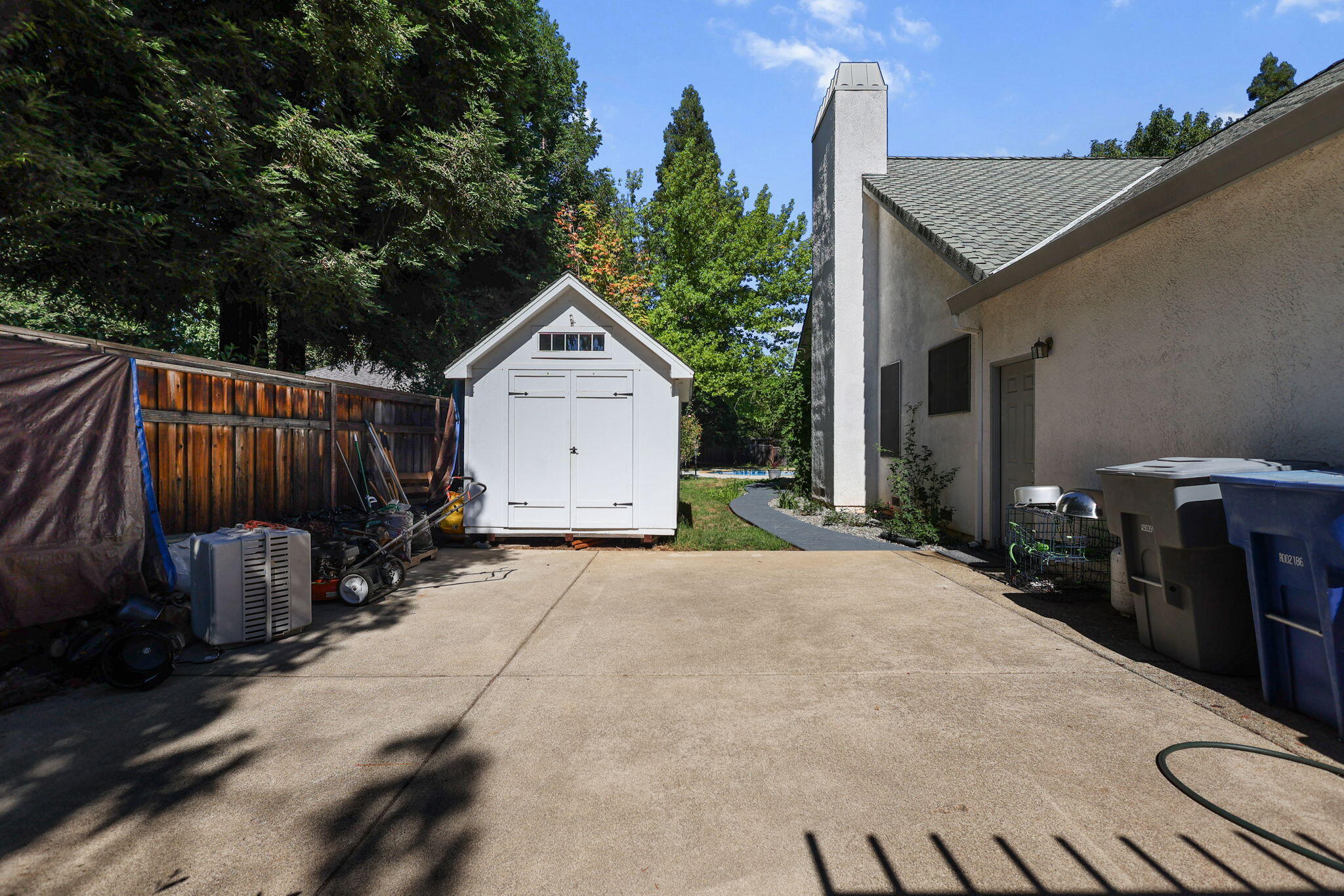 2366 Templeton Drive Redding, CA 96002 - Photo 50 of 54 a view of a house with backyard and sitting area