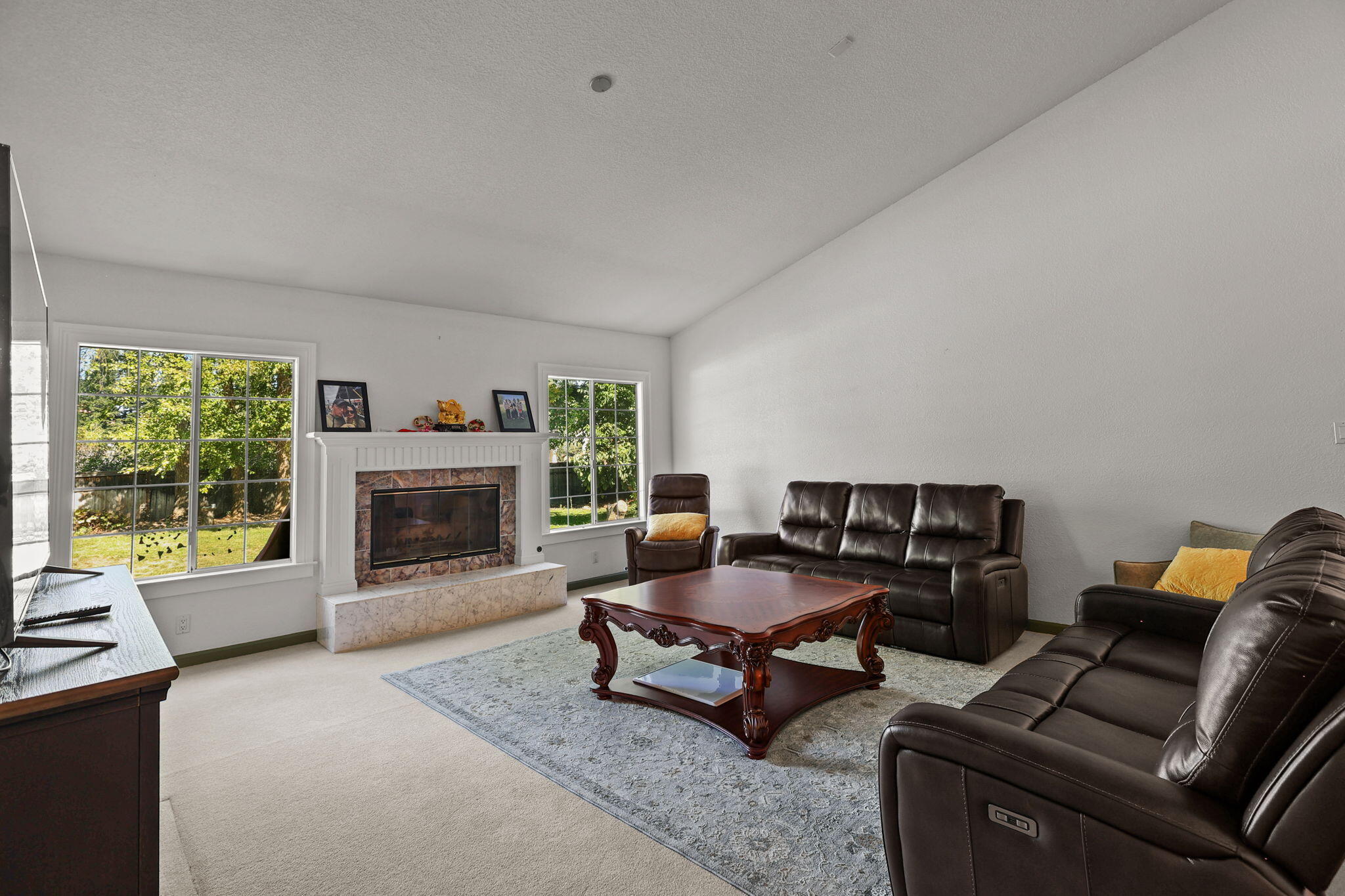 2366 Templeton Drive Redding, CA 96002 - Photo 5 of 54 a living room with furniture and a fireplace