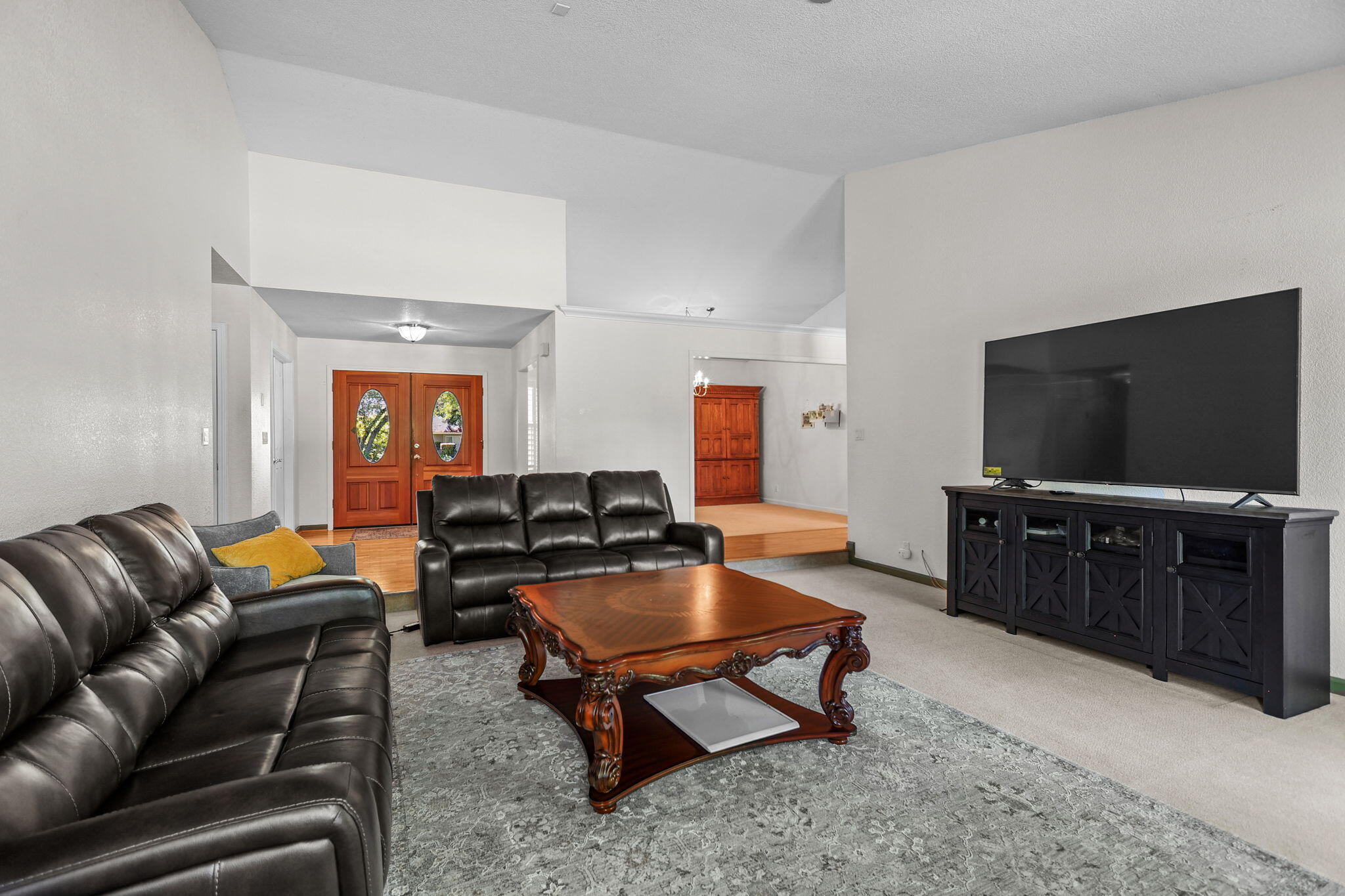 2366 Templeton Drive Redding, CA 96002 - Photo 7 of 54 a living room with furniture and a flat screen tv