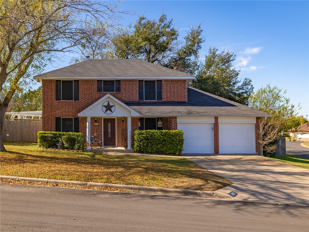 1801 Bent Oak Cove Leander, TX 78641 - Photo 1 of 1 a front view of a house with a yard