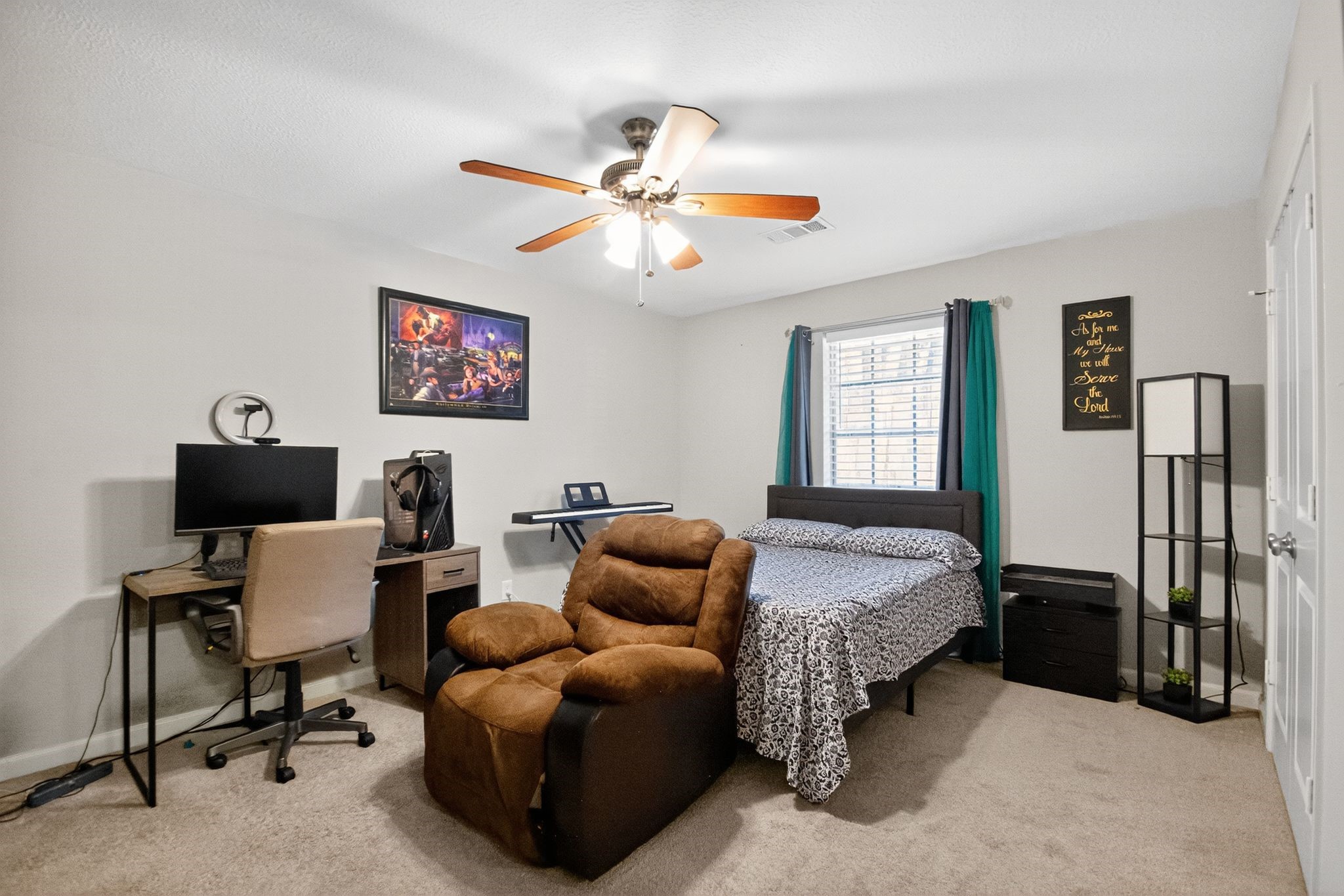 2514 Creekleaf Road Houston, TX 77068 - Photo 13 of 31 a bedroom with furniture and a window