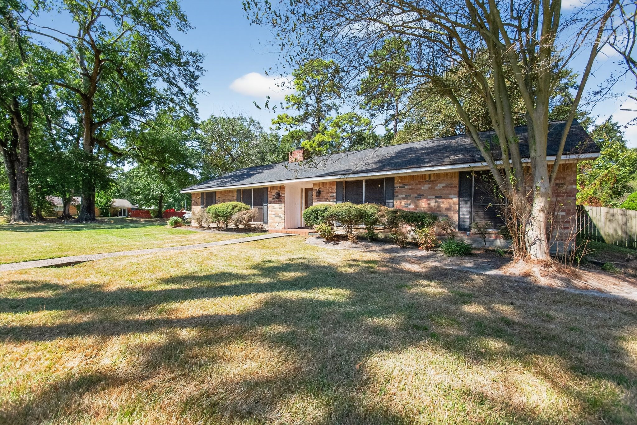 2514 Creekleaf Road Houston, TX 77068 - Photo 27 of 31 a front view of house with yard and green space