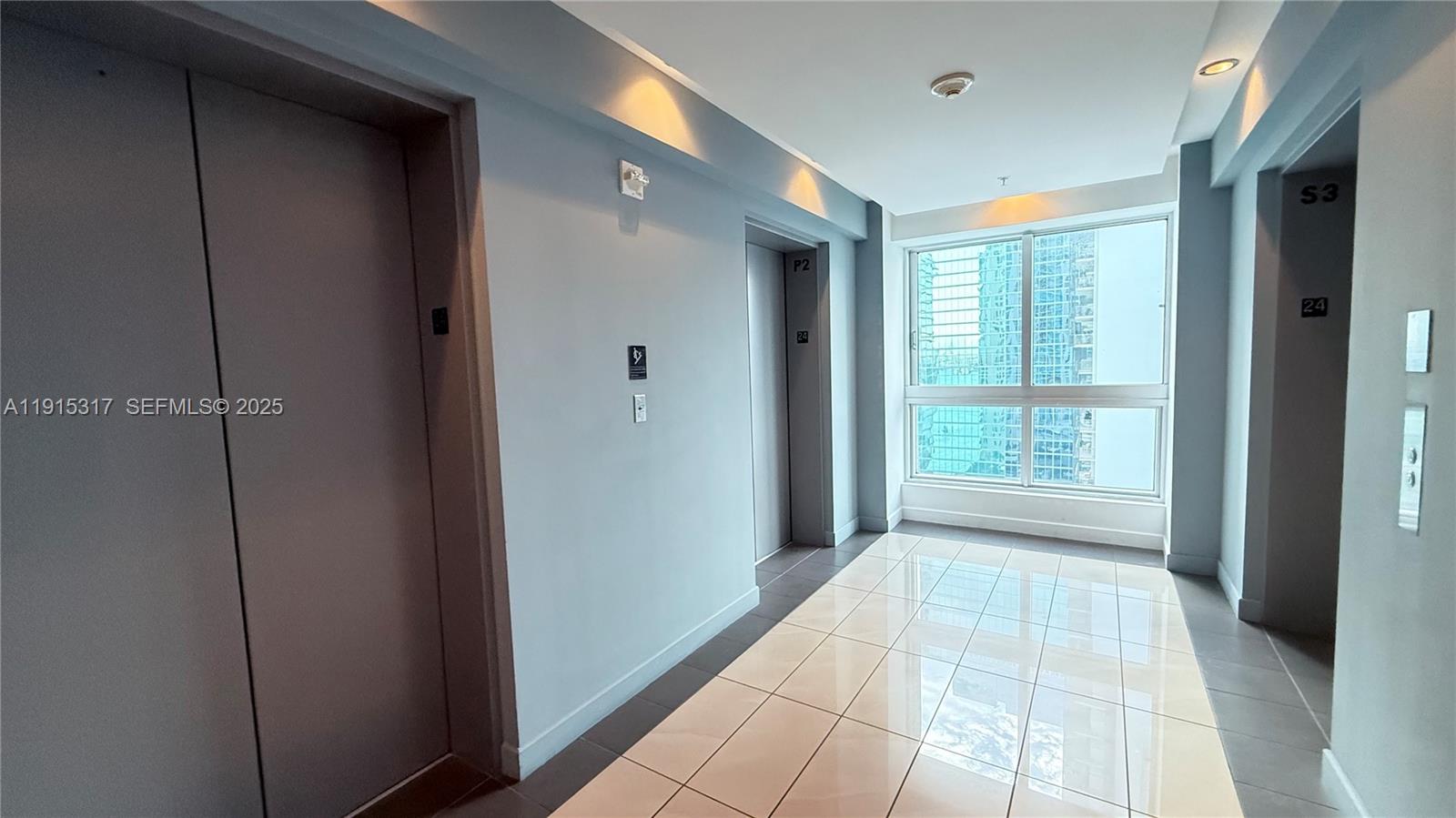300 South Biscayne Boulevard, Unit T2407 Miami, FL 33131 - Photo 15 of 49 a view of an empty room with a window