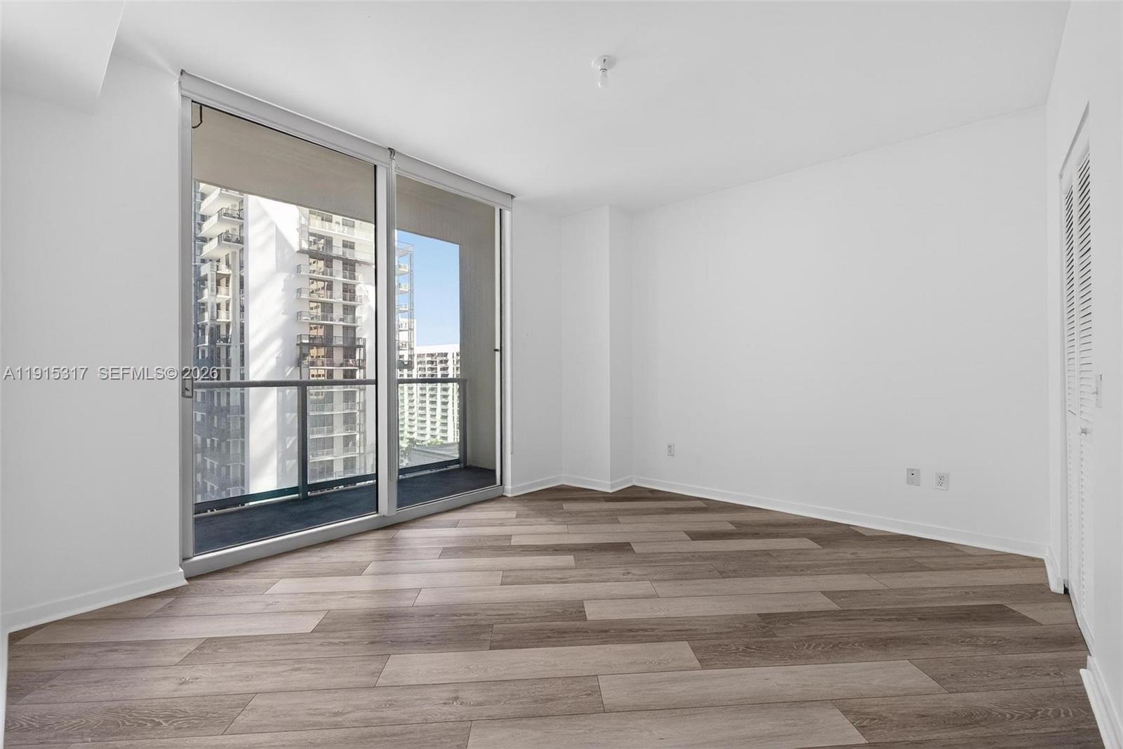 300 South Biscayne Boulevard, Unit T2407 Miami, FL 33131 - Photo 26 of 39 a view of an empty room with a window