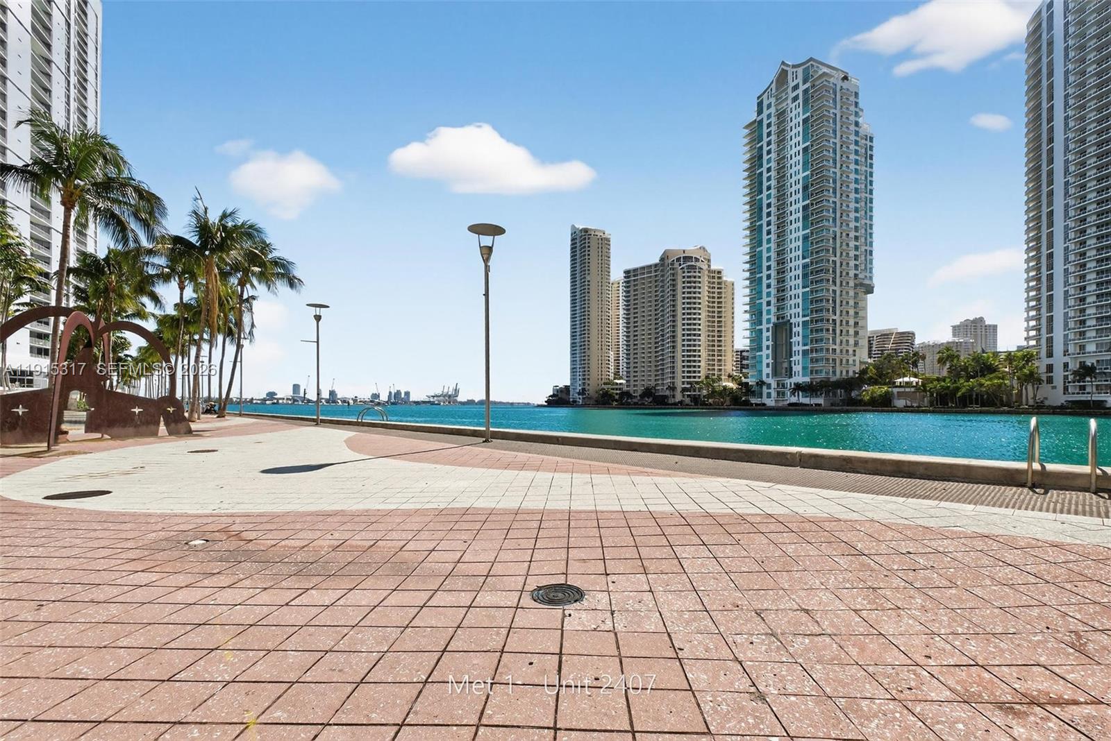 300 South Biscayne Boulevard, Unit T2407 Miami, FL 33131 - Photo 3 of 39 a view of a city with tall buildings
