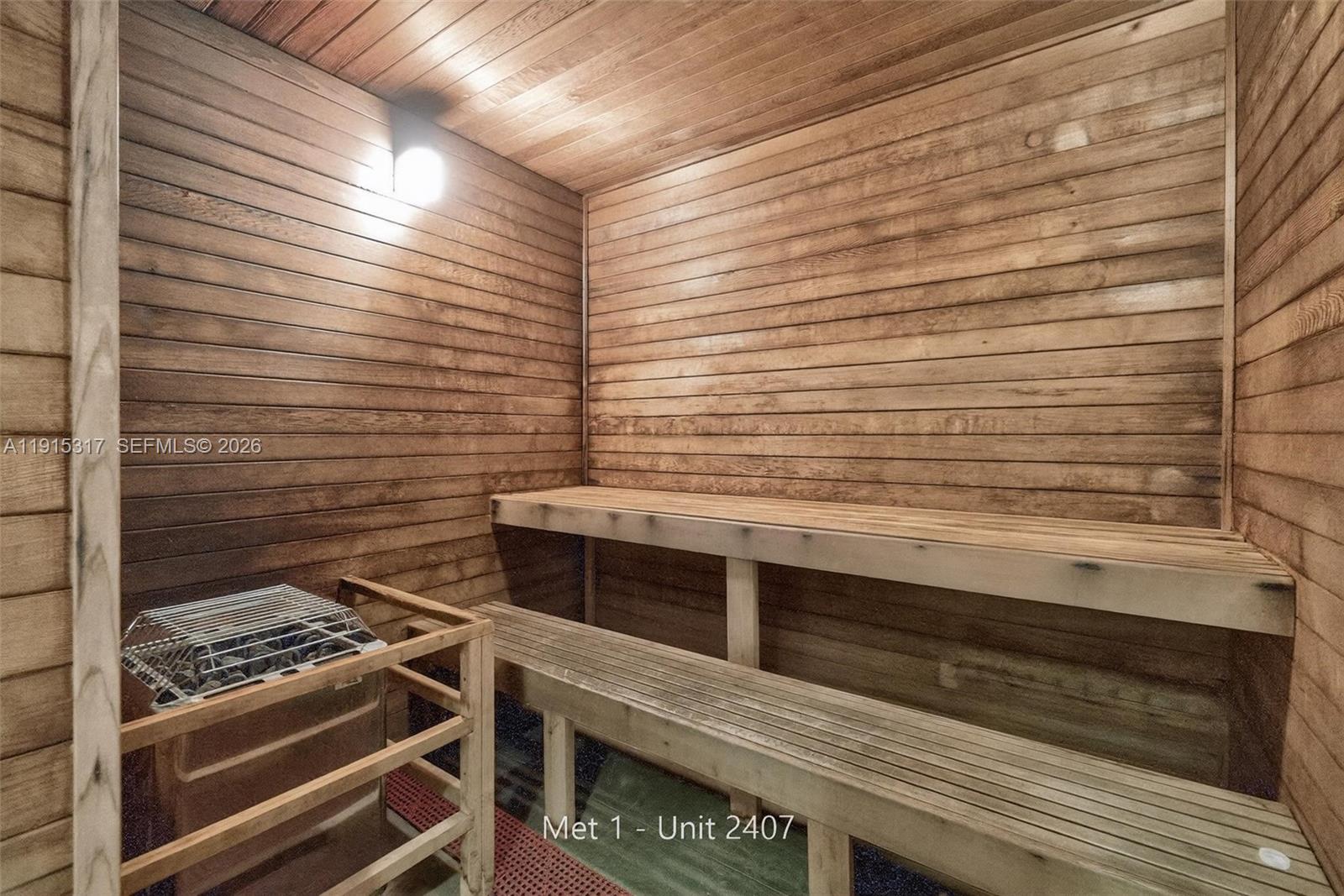 300 South Biscayne Boulevard, Unit T2407 Miami, FL 33131 - Photo 35 of 39 a stove top oven sitting inside of a kitchen