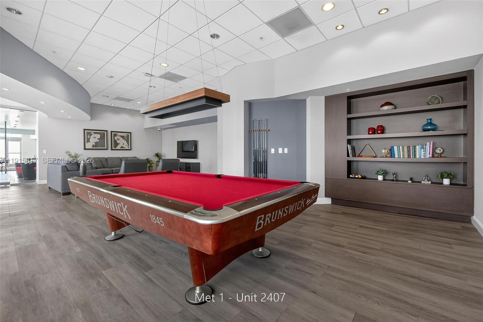 300 South Biscayne Boulevard, Unit T2407 Miami, FL 33131 - Photo 37 of 39 a room with pool table and a wooden floor