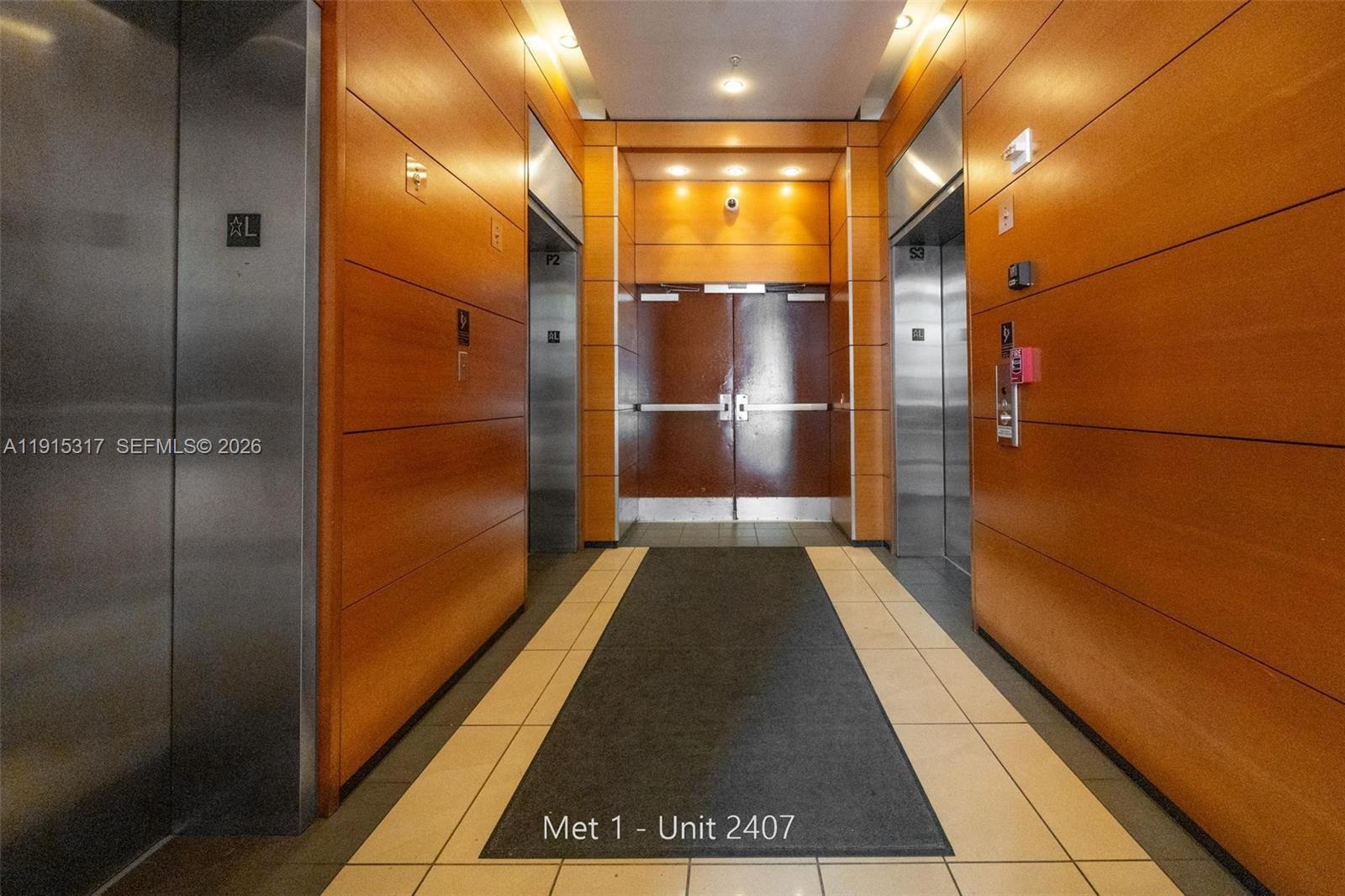 300 South Biscayne Boulevard, Unit T2407 Miami, FL 33131 - Photo 6 of 39 a bathroom with a shower