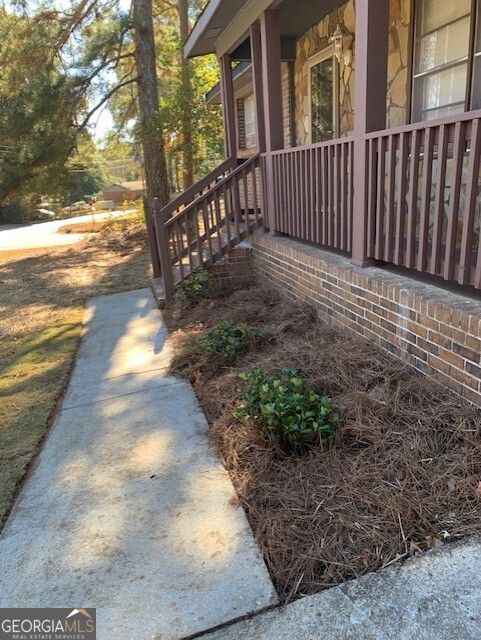 10167 Waterford Road Northeast Covington, GA 30014 - Photo 8 of 9 a view of a pathway with a yard