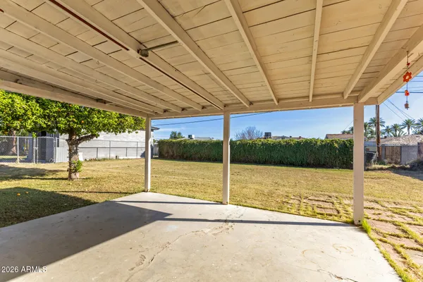 a view of a yard with an outdoor space
