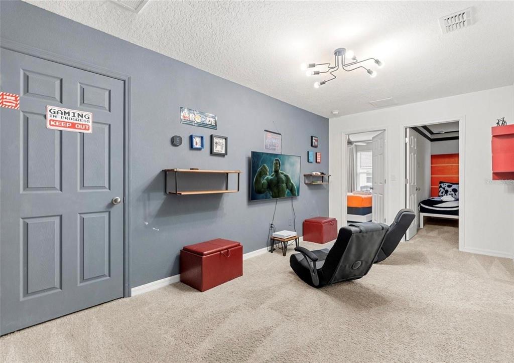 2163 Copper Bell Place Kissimmee, FL 34747 - Photo 28 of 41 a living room with furniture