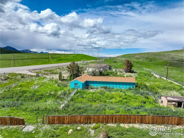 a view of a lake with a big yard