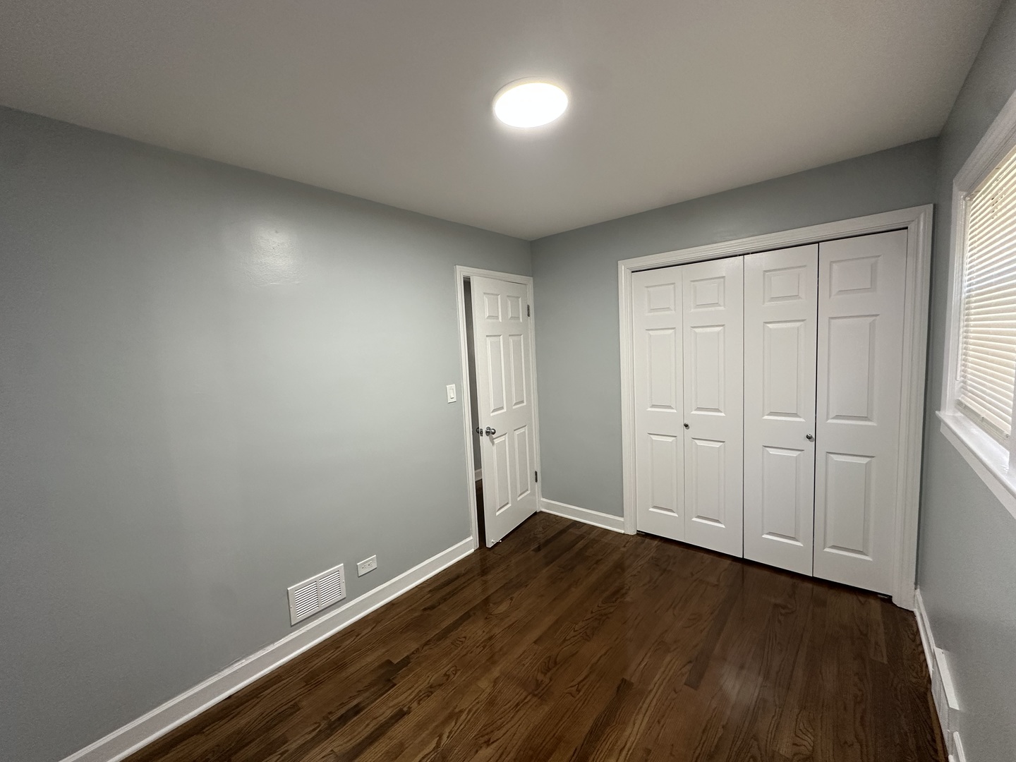 8232 Keating Avenue, Unit 1 Skokie, IL 60076 - Photo 18 of 21 a view of room with hardwood floor