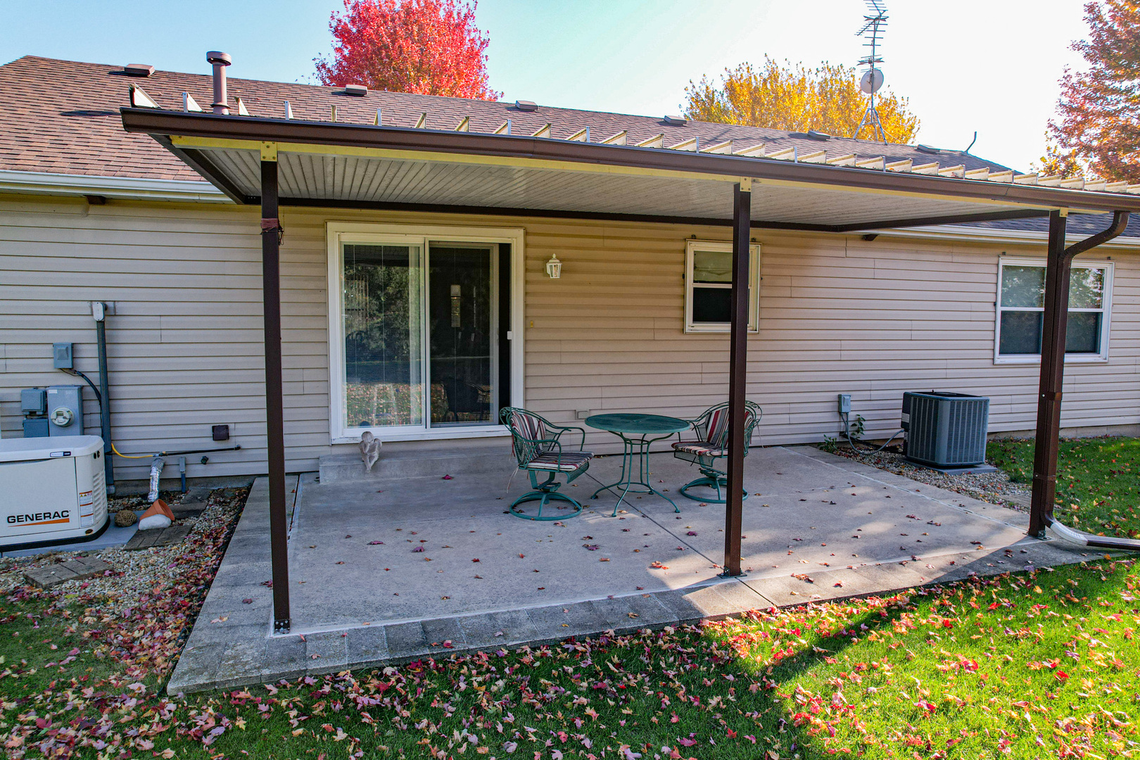8752 Perryville Road Monroe Center, IL 61052 - Photo 14 of 41 a front view of a house with garden