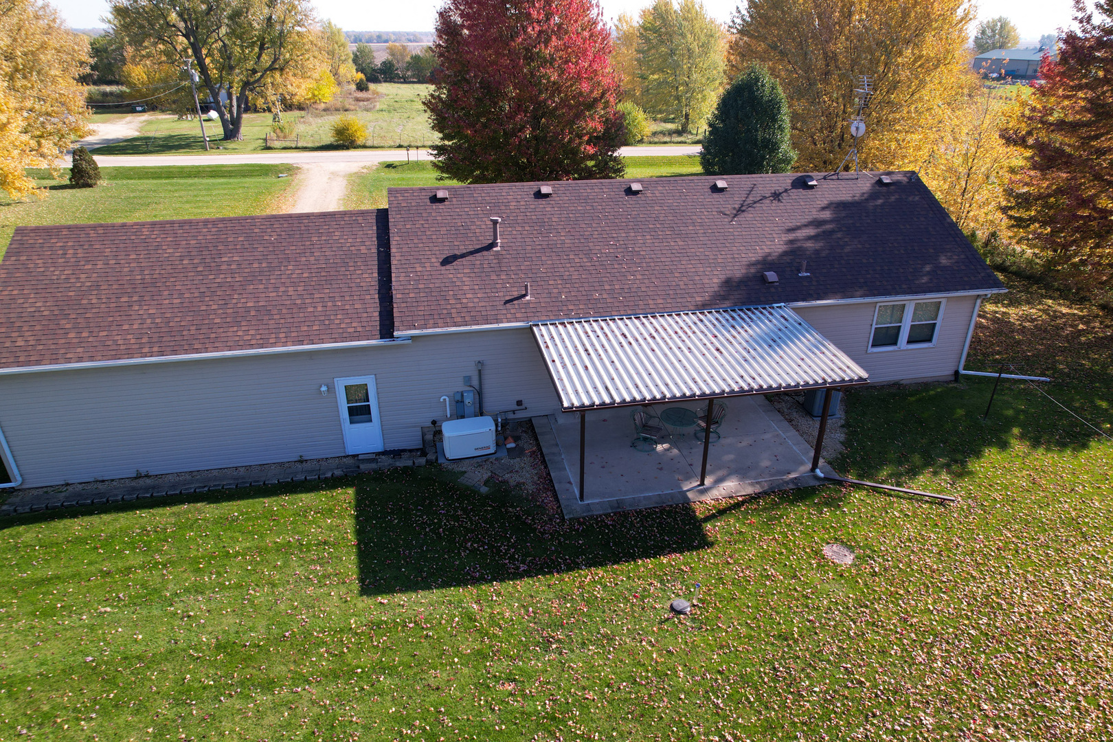 8752 Perryville Road Monroe Center, IL 61052 - Photo 17 of 41 a view of a house with a yard