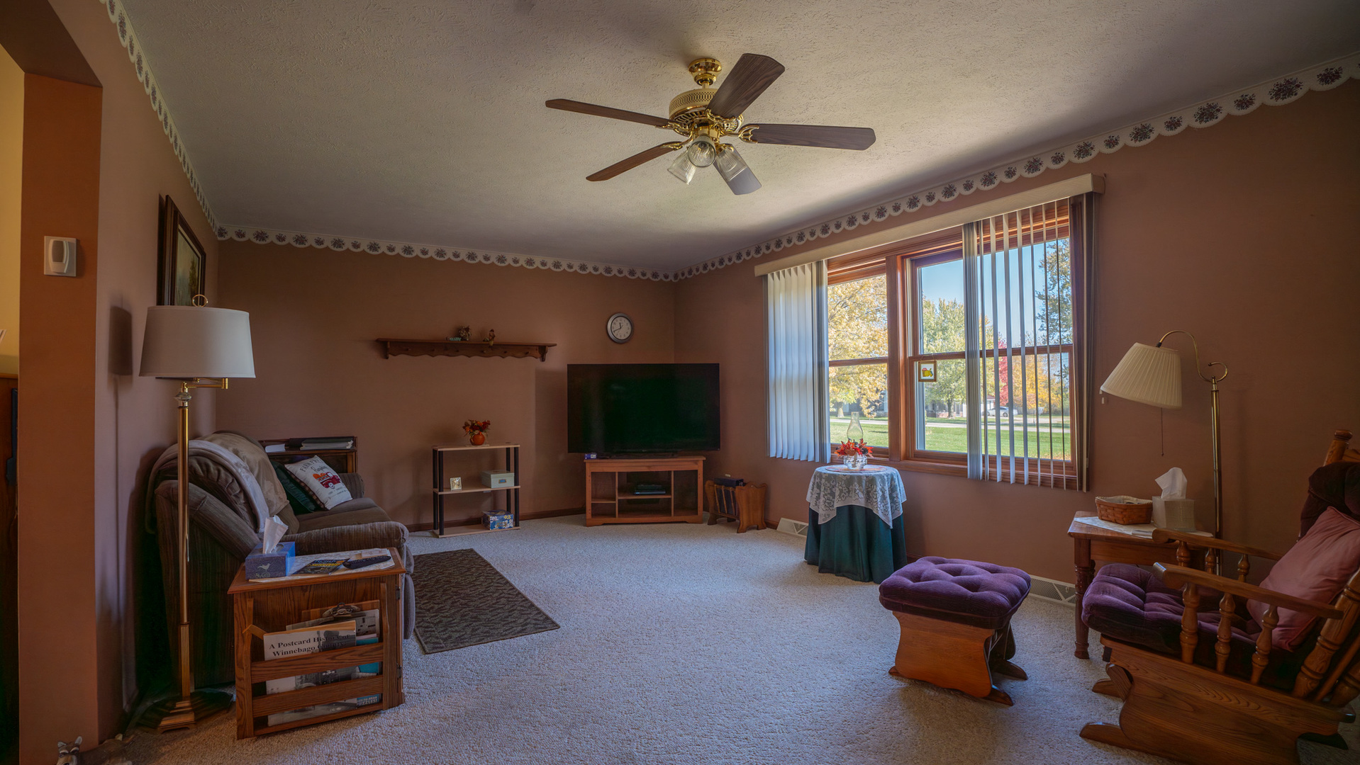8752 Perryville Road Monroe Center, IL 61052 - Photo 23 of 41 a living room with furniture gym equipment and a flat screen tv