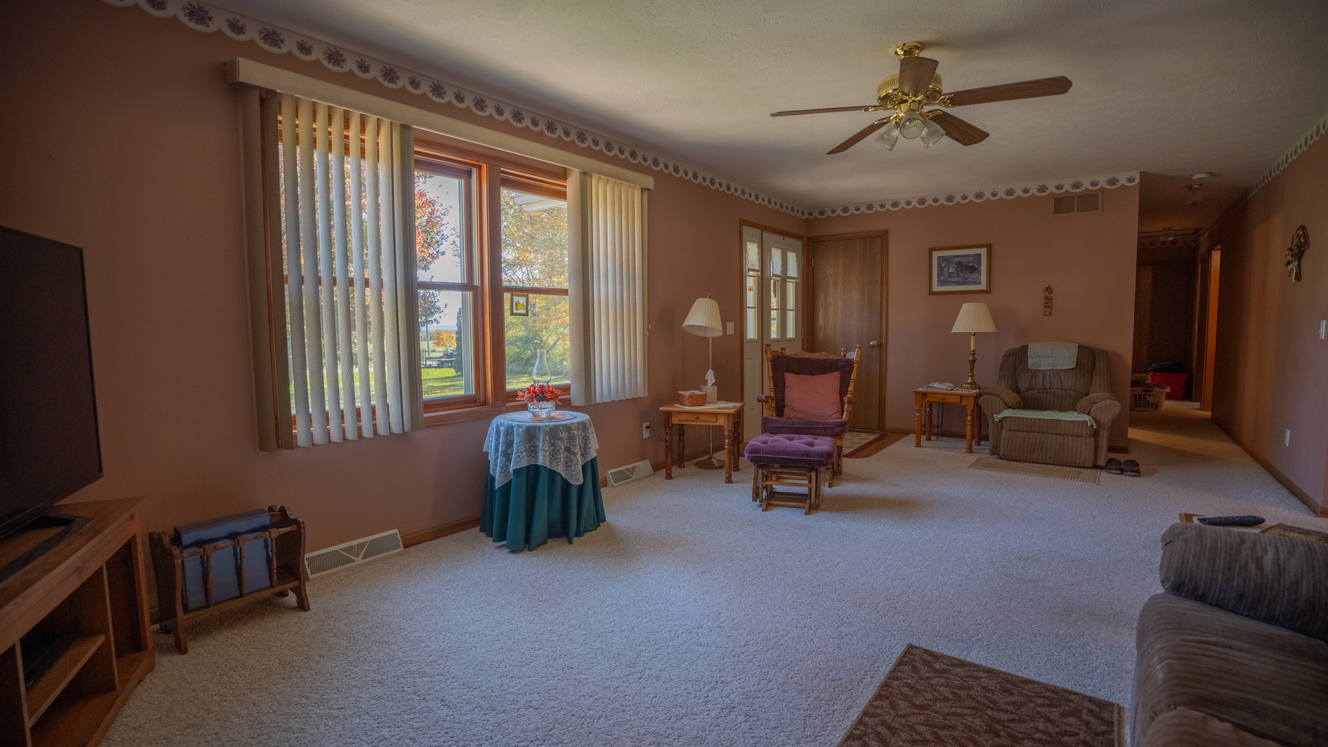 8752 Perryville Road Monroe Center, IL 61052 - Photo 24 of 41 a living room with furniture and a flat screen tv