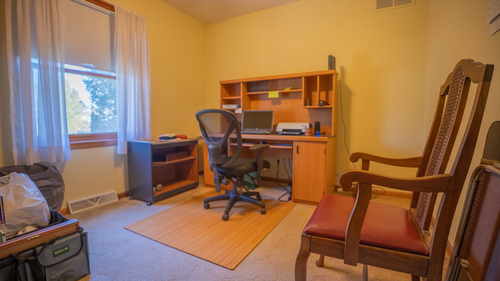 8752 Perryville Road Monroe Center, IL 61052 - Photo 33 of 41 a view of a workspace with furniture and a window